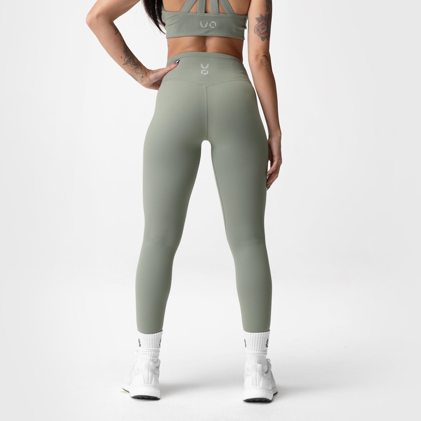 ASRV x Equinox Lycra® 7/8 legging in sage, rear view on model