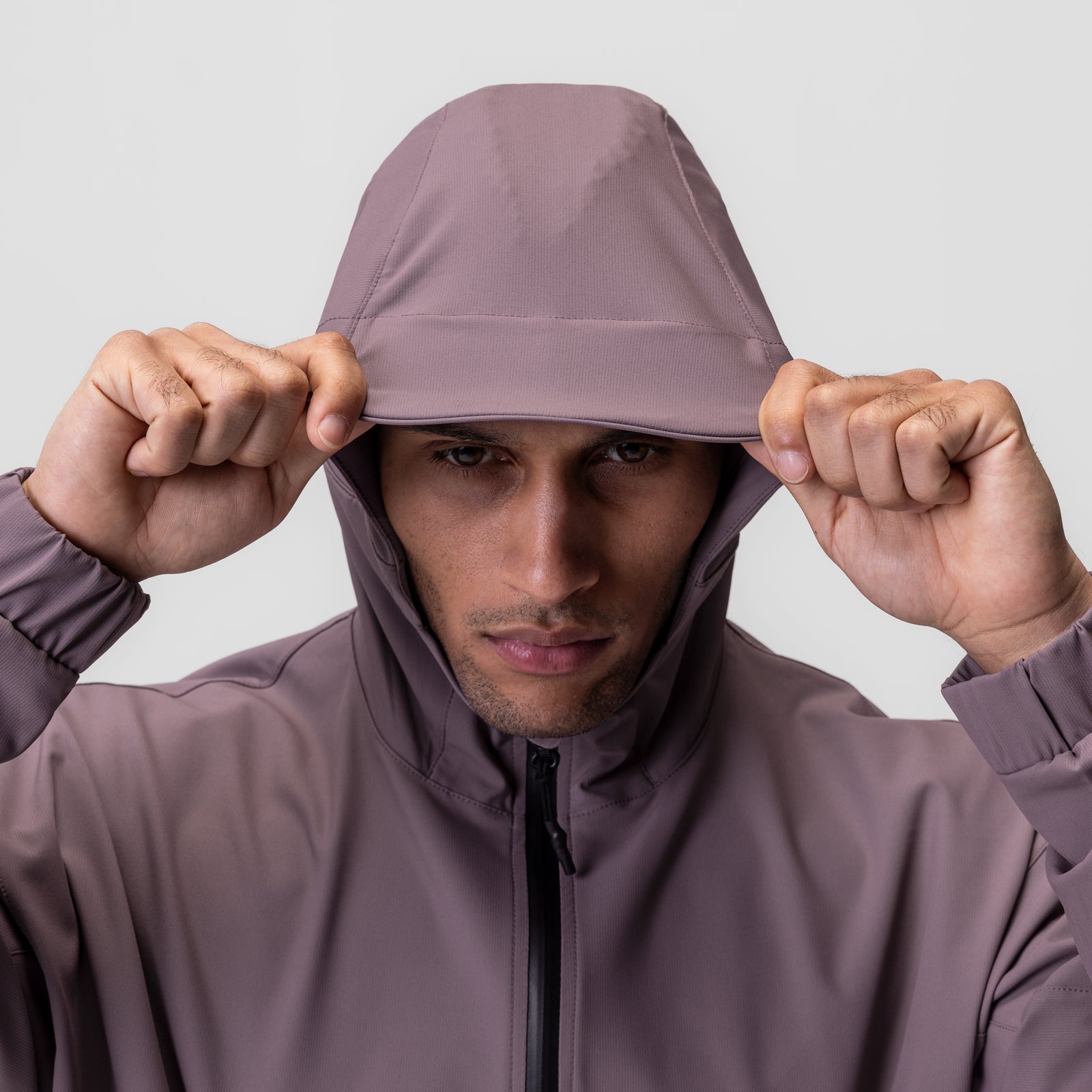 Weather-Ready Anorak Jacket in Moonscape, model wearing and adjusting hood