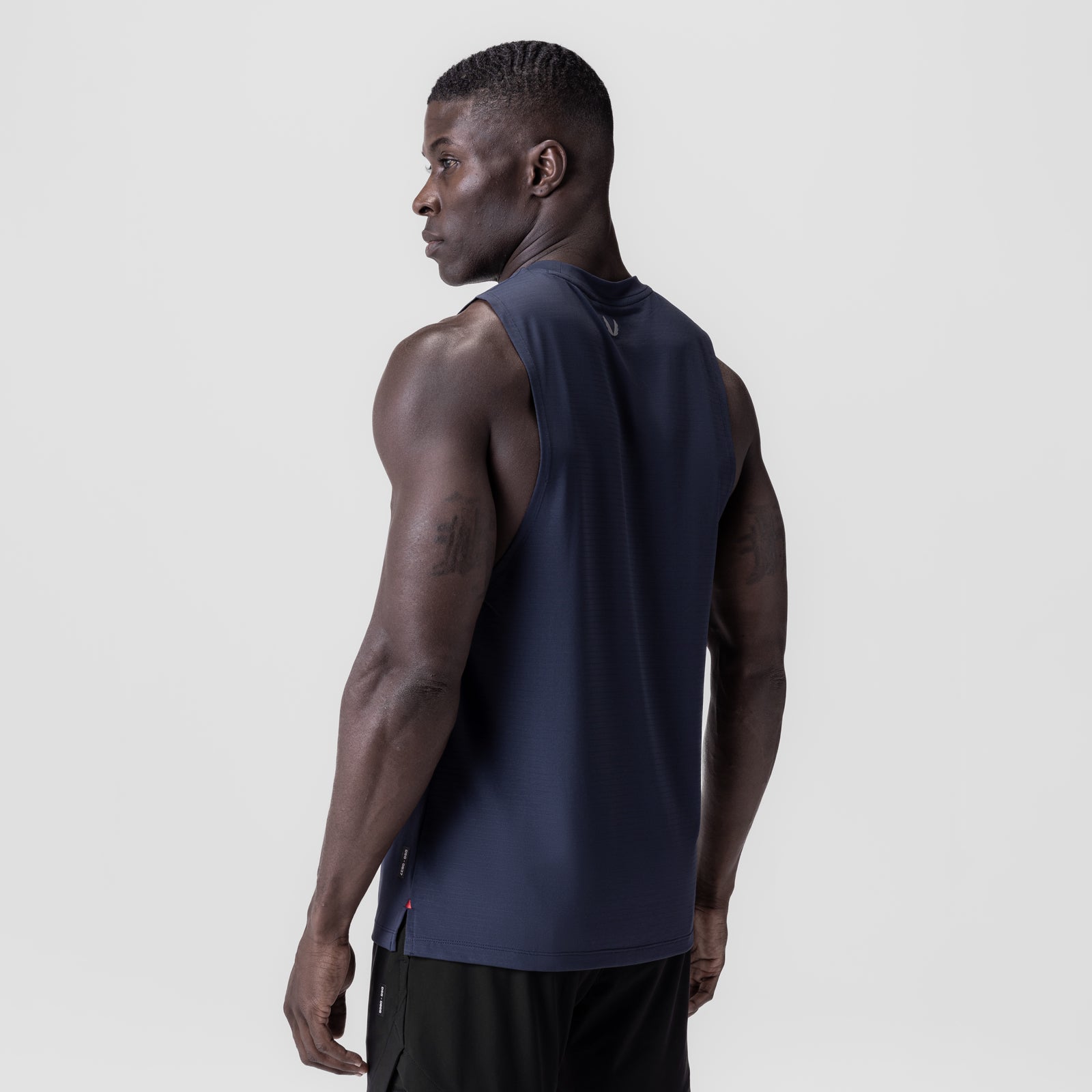 Navy 3D-Lite® 2.0 Lycra® Muscle Tank worn by model, side view
