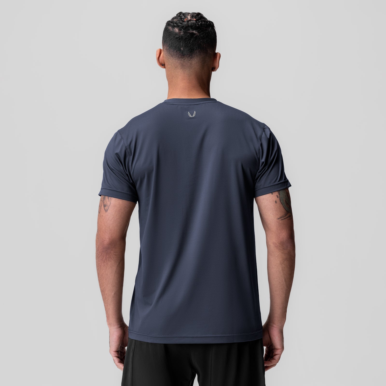 AeroSilver Essential Tee in navy, rear view on model