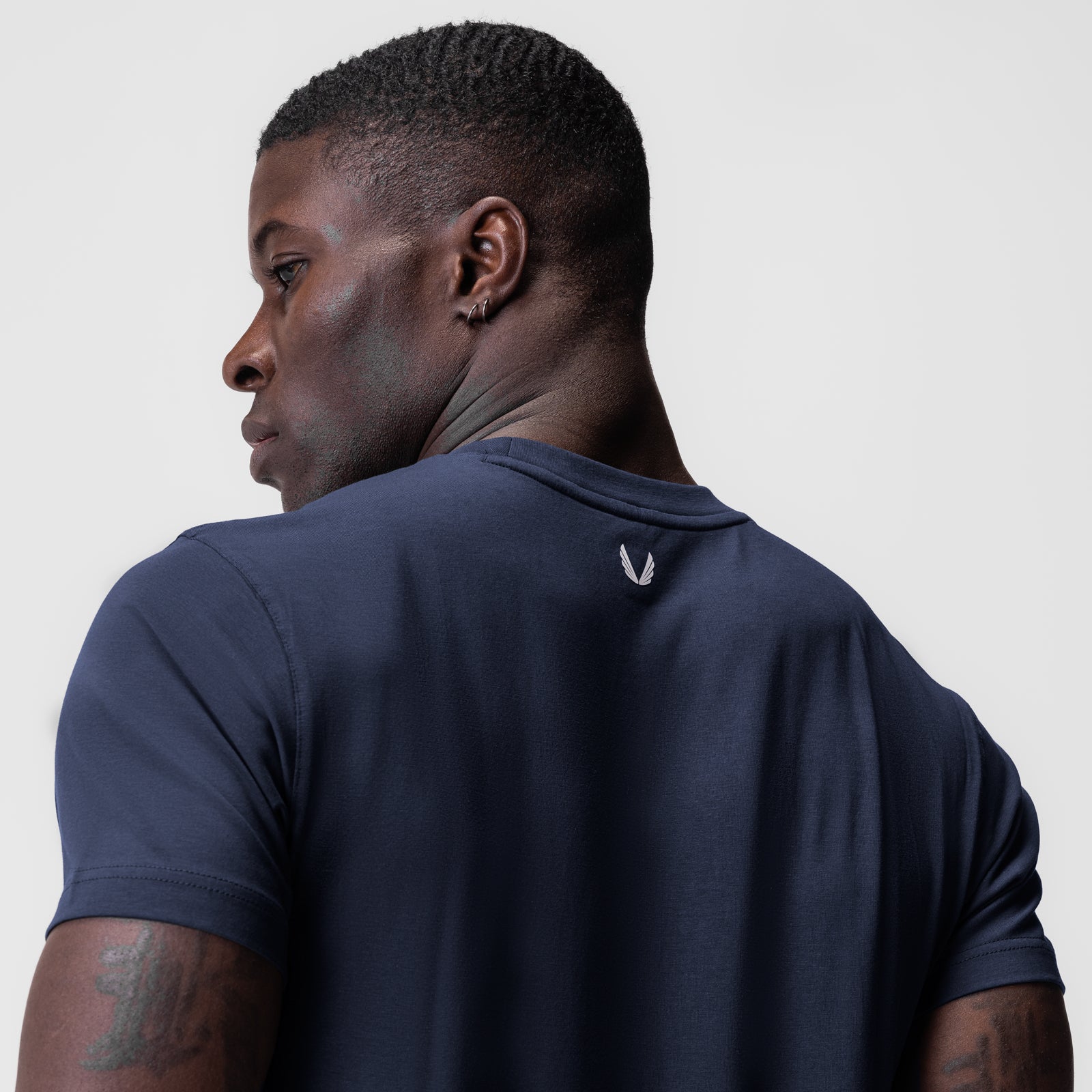 Navy Supima® Essential Tee worn by model, back view