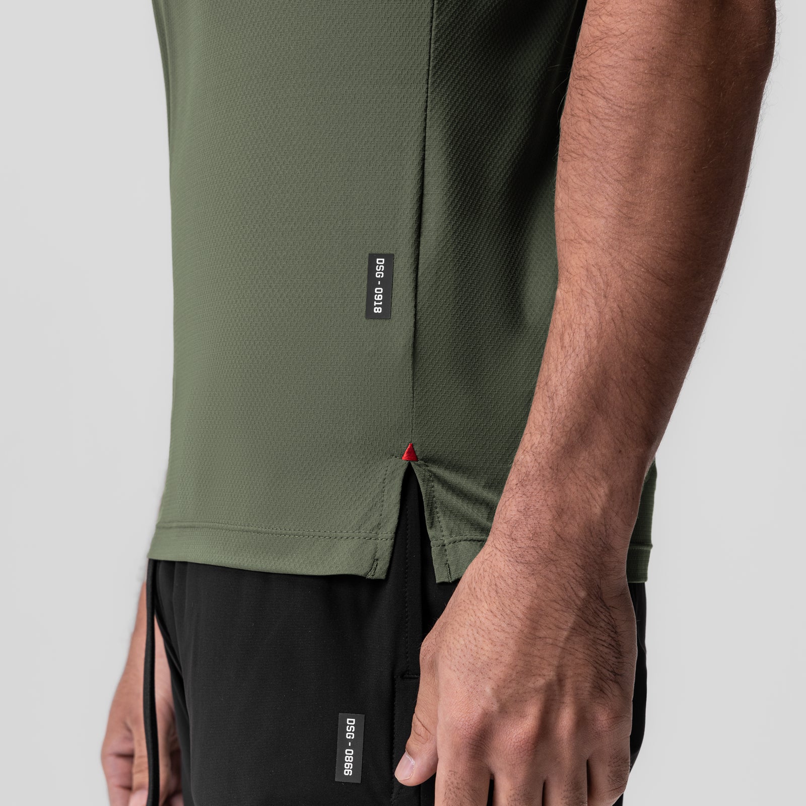 AeroSilver Fitted Tee in olive worn by model, side detail view