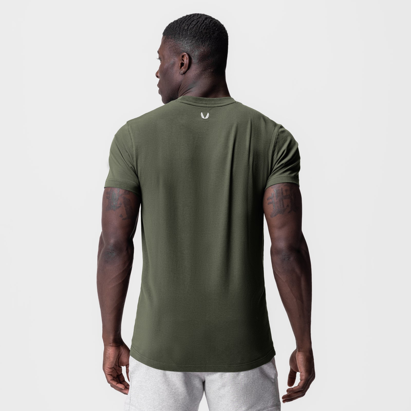 Supima Essential Tee in olive, back view on model