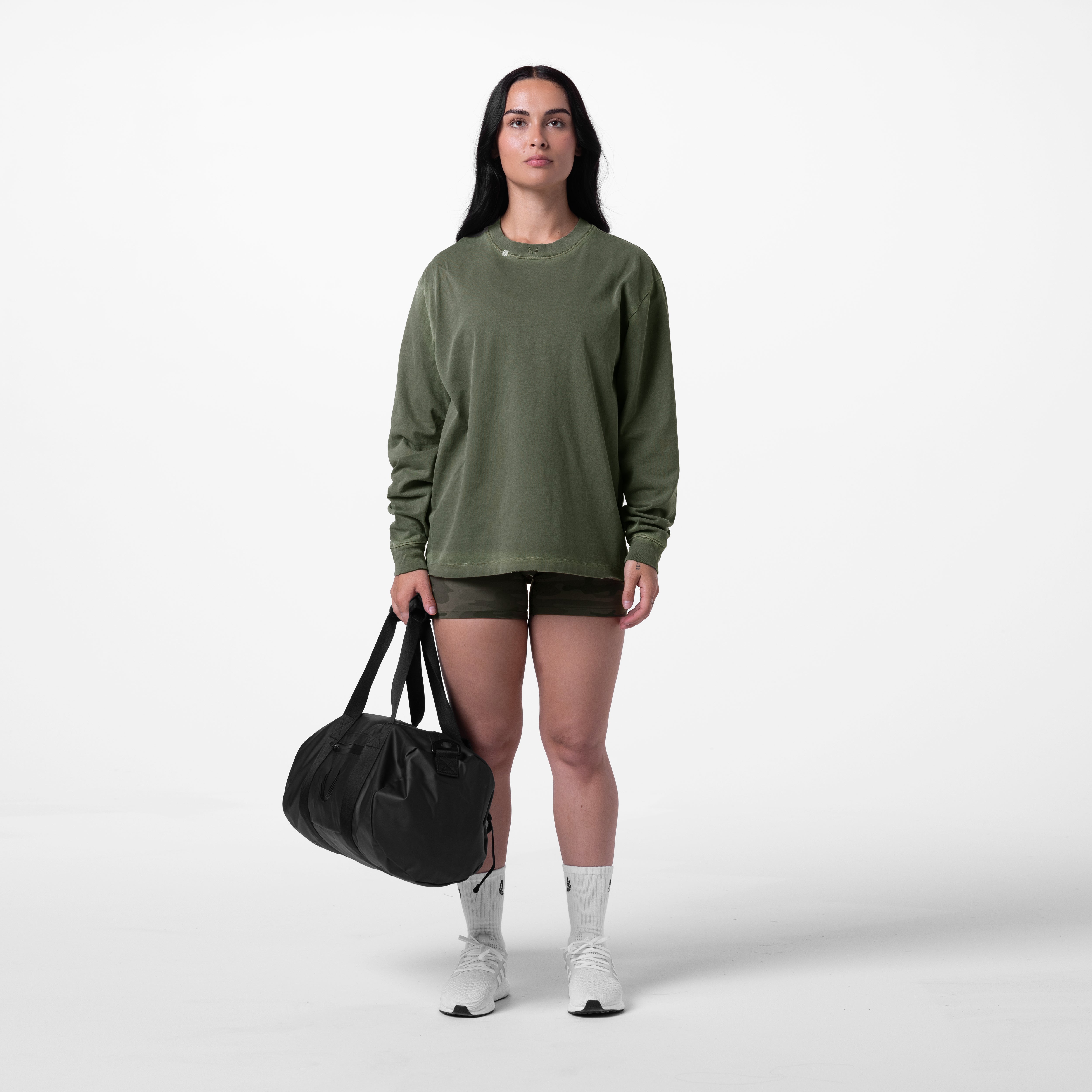 Tech Essential Relaxed Long Sleeve in faded olive worn with matching shorts, front view
