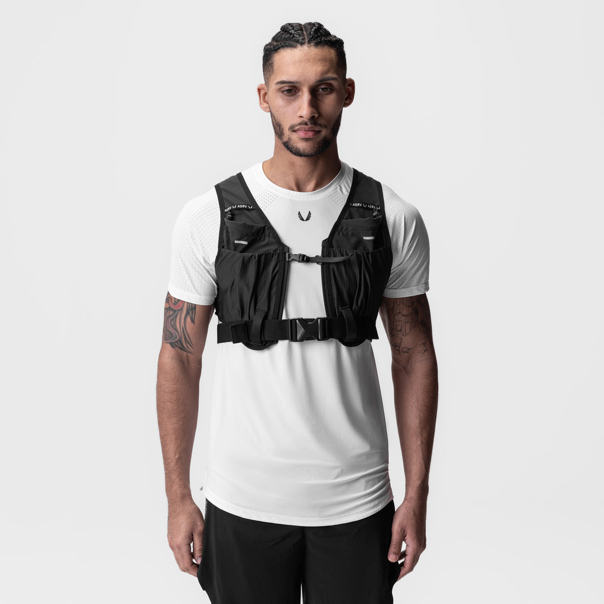2-in-1 Packable Run Vest in black, front view on model
