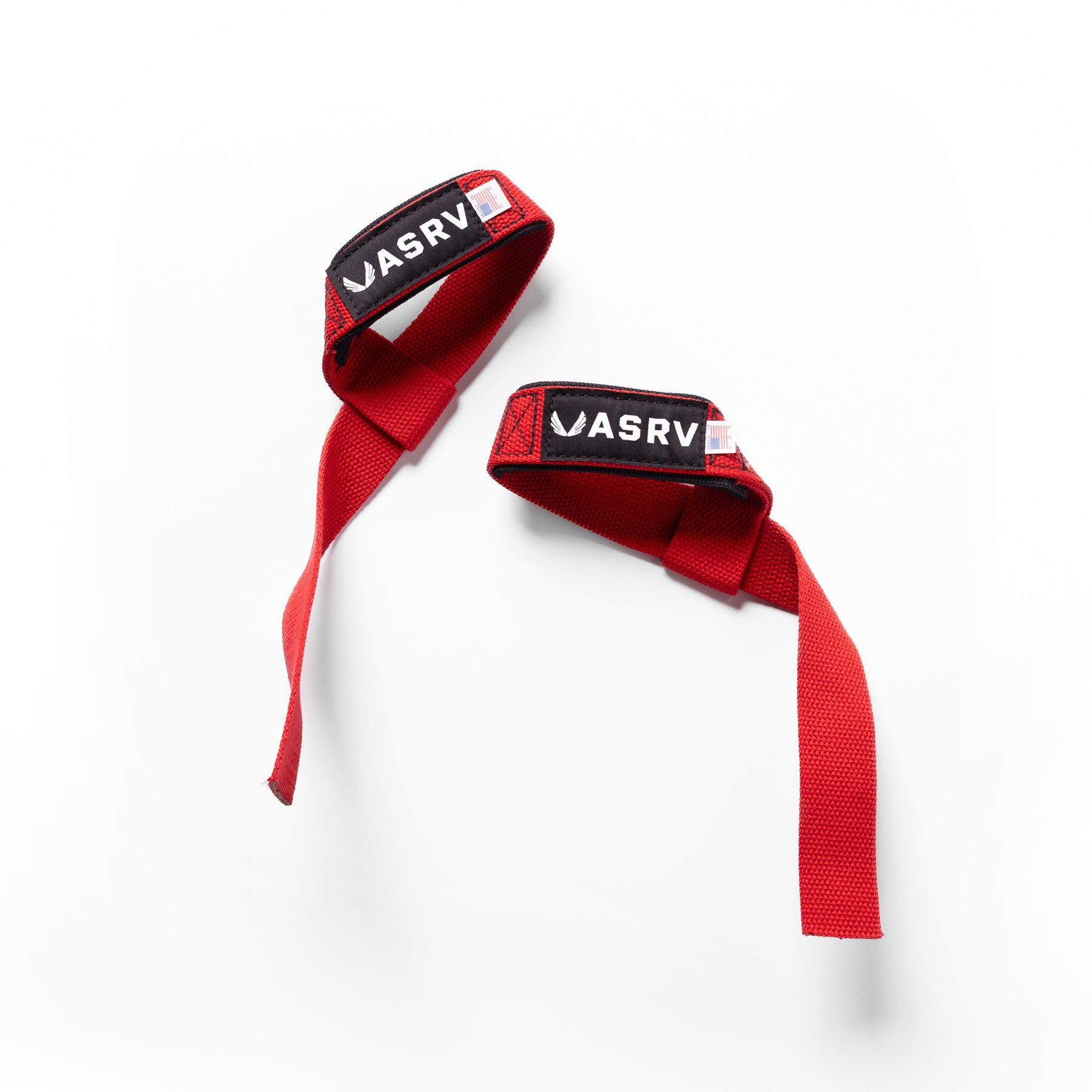 flatlay of padded lifting straps in akira red, overhead view