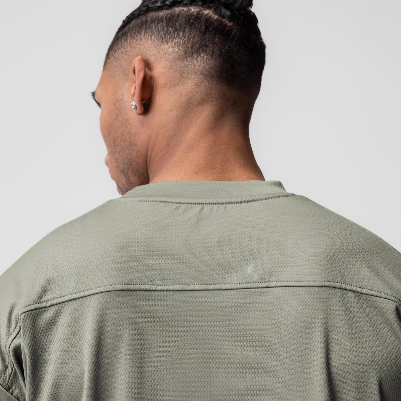AeroSilver Oversized Tee in sage, worn by model shown from back