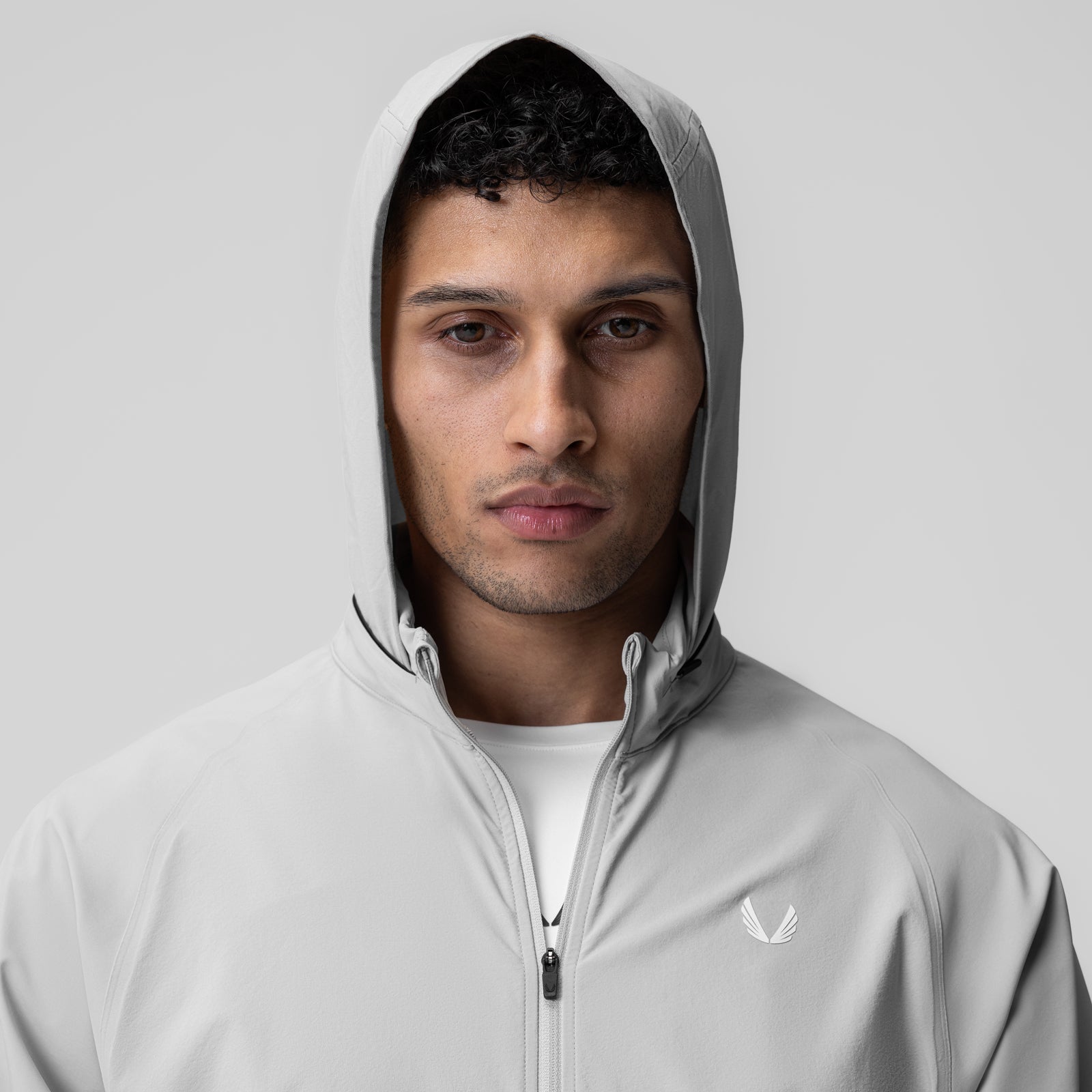 Aerotex Weather-Ready Bonded Windbreaker in slate grey, worn with hood up
