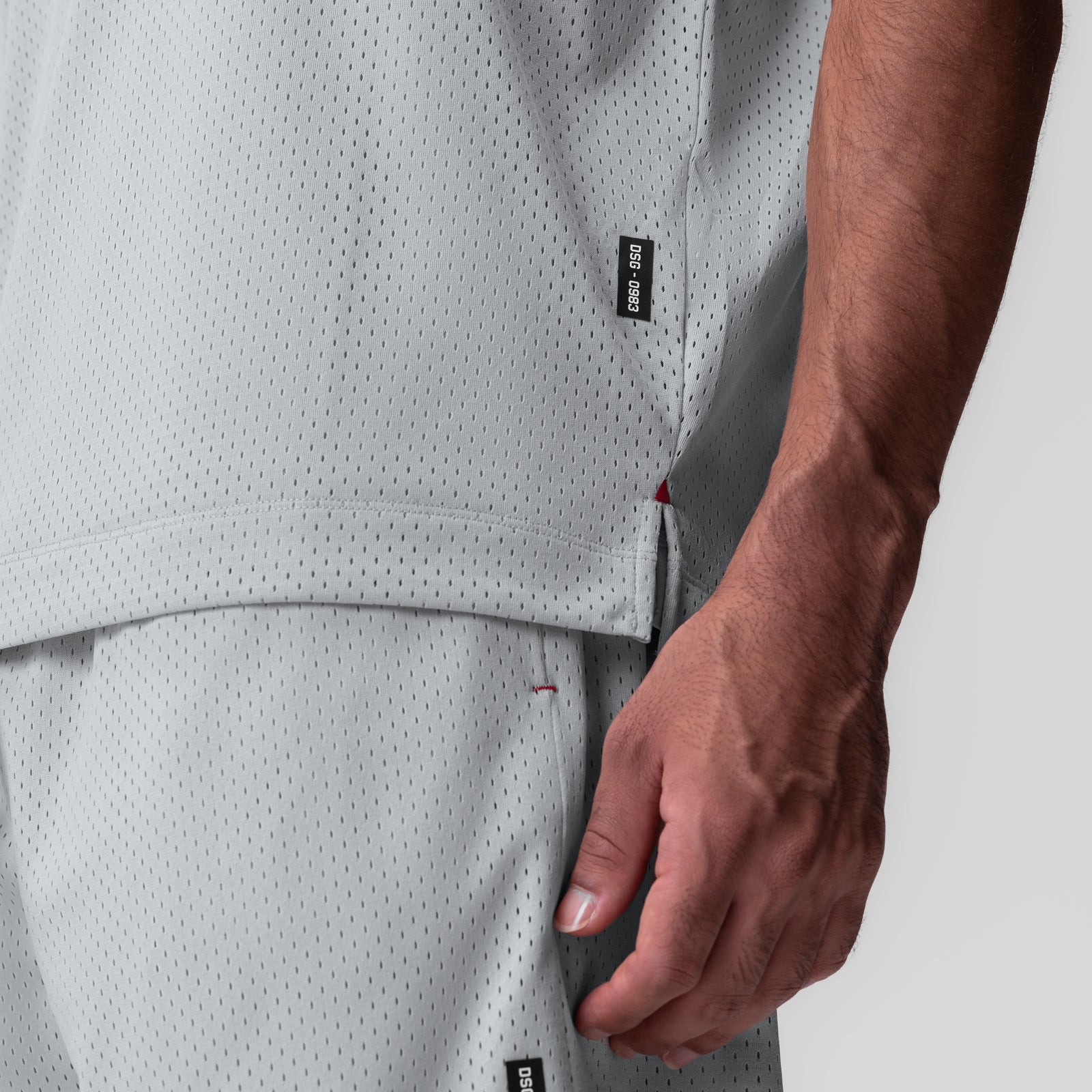 Reversible 2-in-1 Cutoff Hoodie in slate grey, worn by model showing side detail and fit