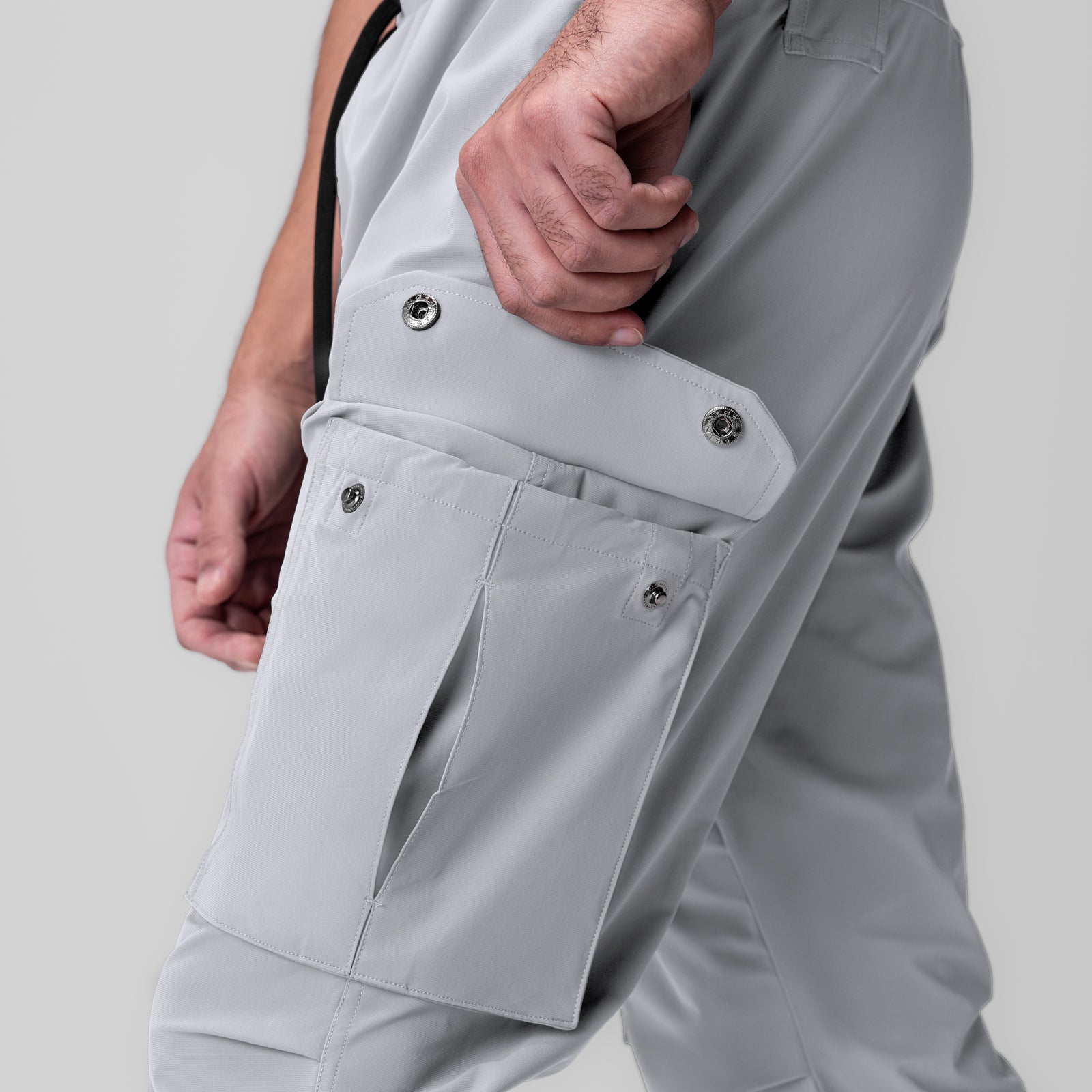 Tetra-Lite Ice Cargo High Rib Jogger in slate grey, worn by model showing cargo pocket detail