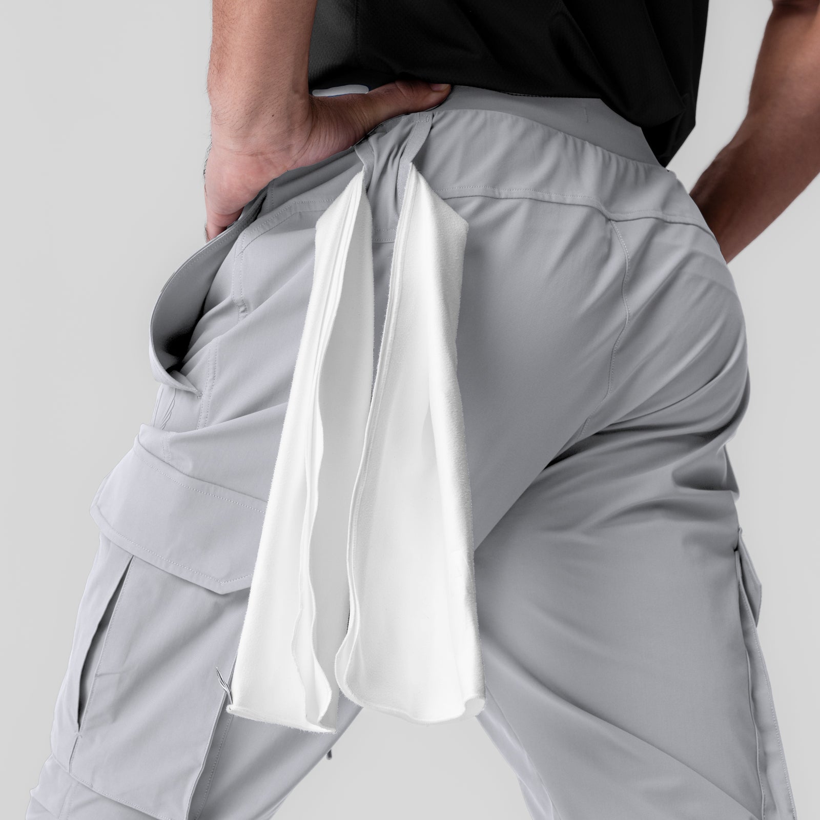Tetra-Lite Ice Cargo jogger in slate grey worn by model, side view showing cargo pocket detail