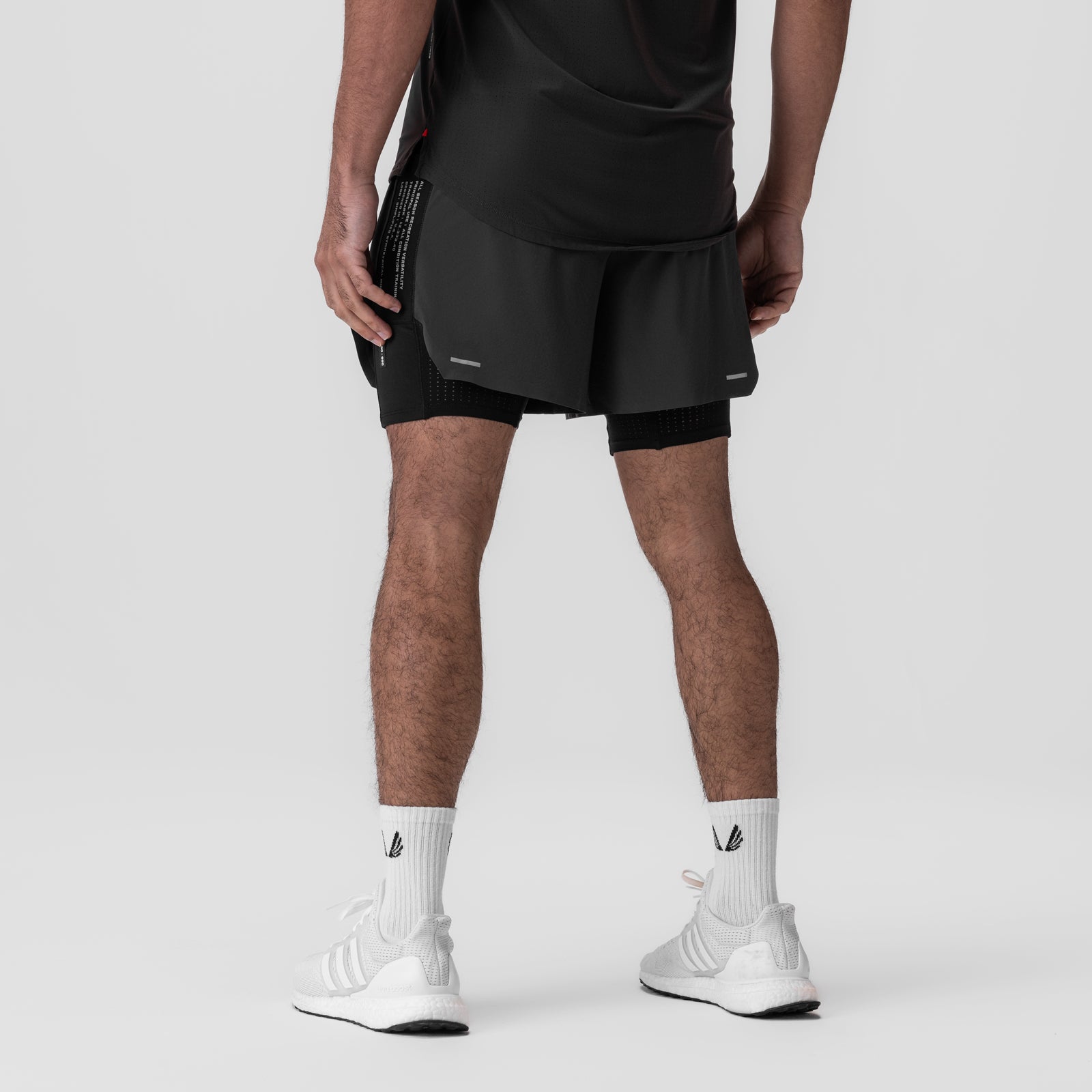 Aerotex Hybrid Liner Short in space grey and black, back view on model