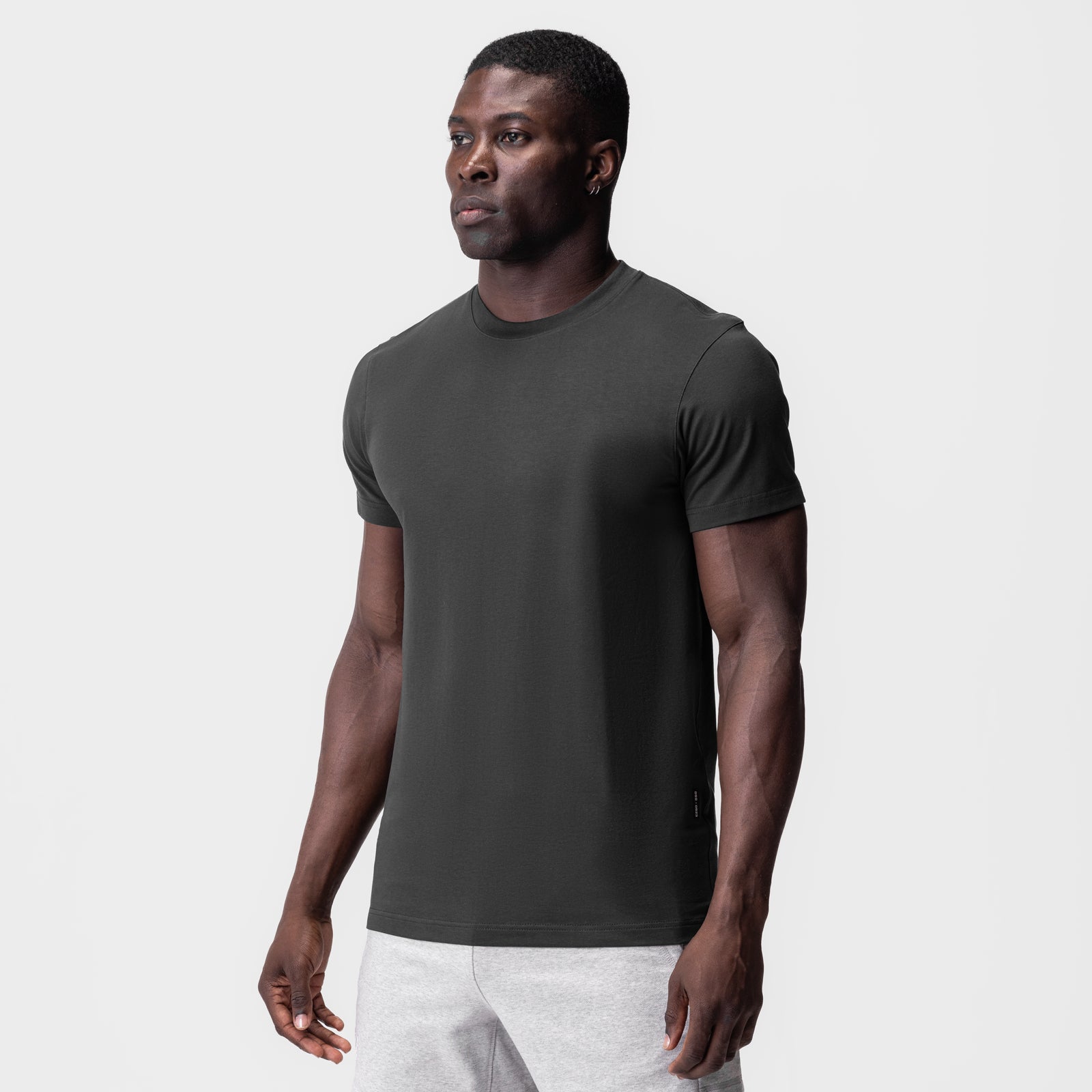 Supima® Essential Tee in space grey, worn by model in three-quarter front view
