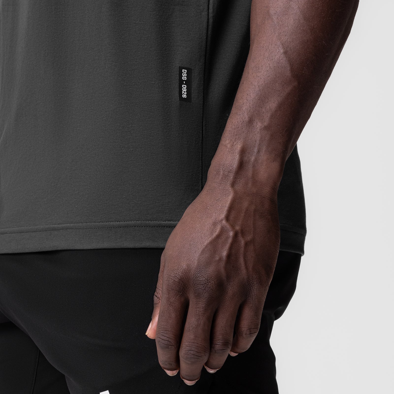 0926 Supima® Muscle Tank in Space Grey, worn by model, side detail view