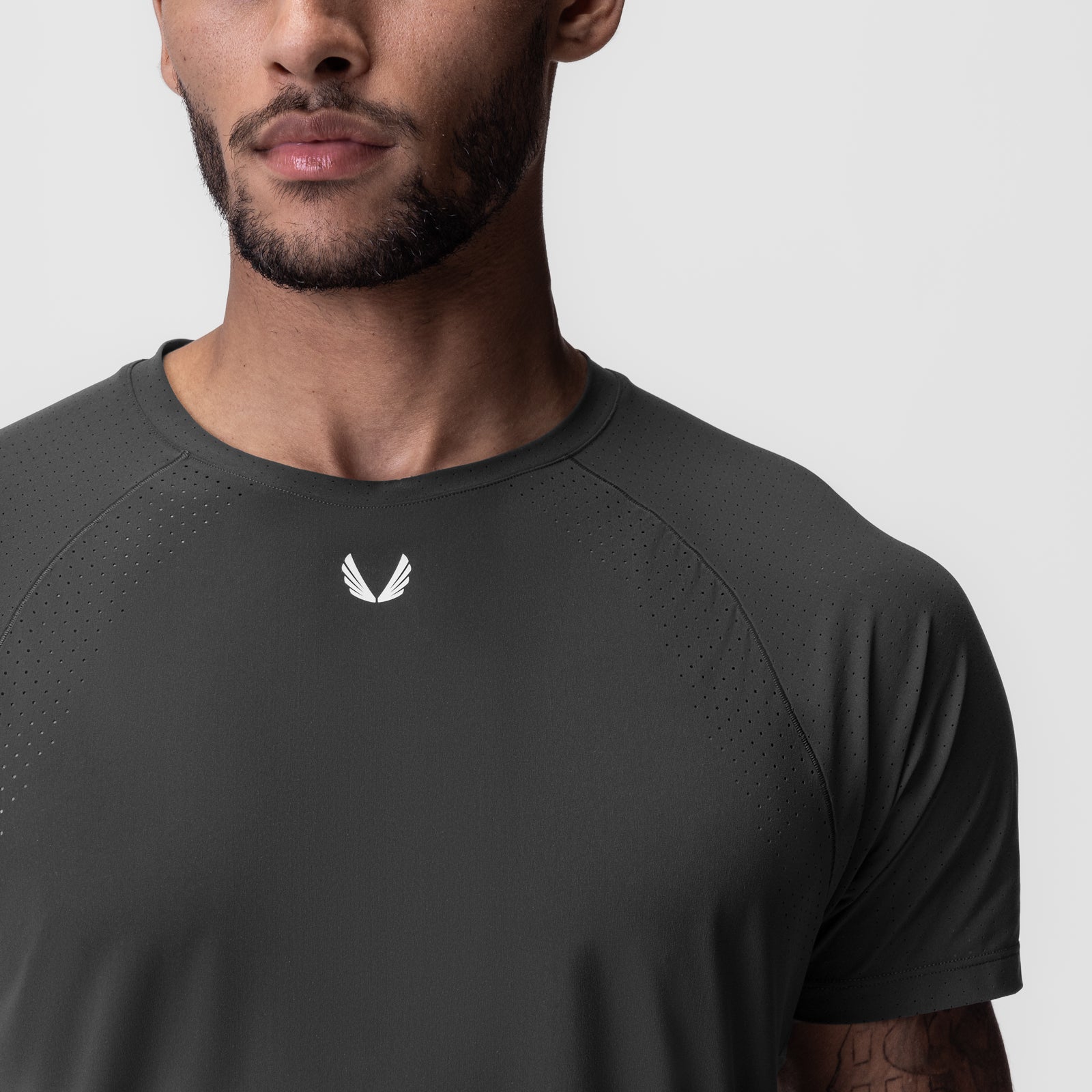 Laser-Vent Established Tee in space grey worn by model, front view