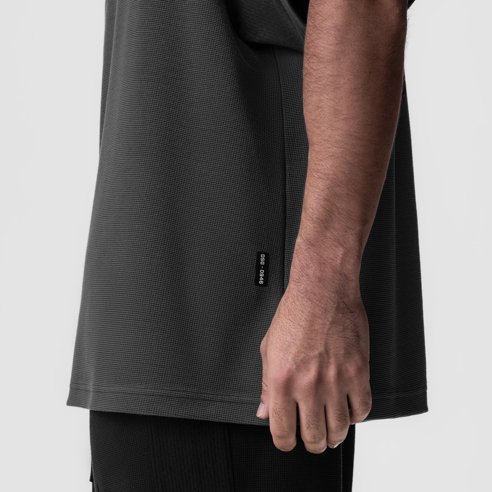 Waffle knit oversized tee in space grey worn by model, side view