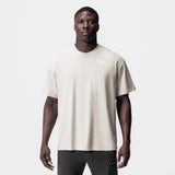 0797. Tech Essential™ Relaxed Tee - Stone/White "Brush Wings/ASRV"