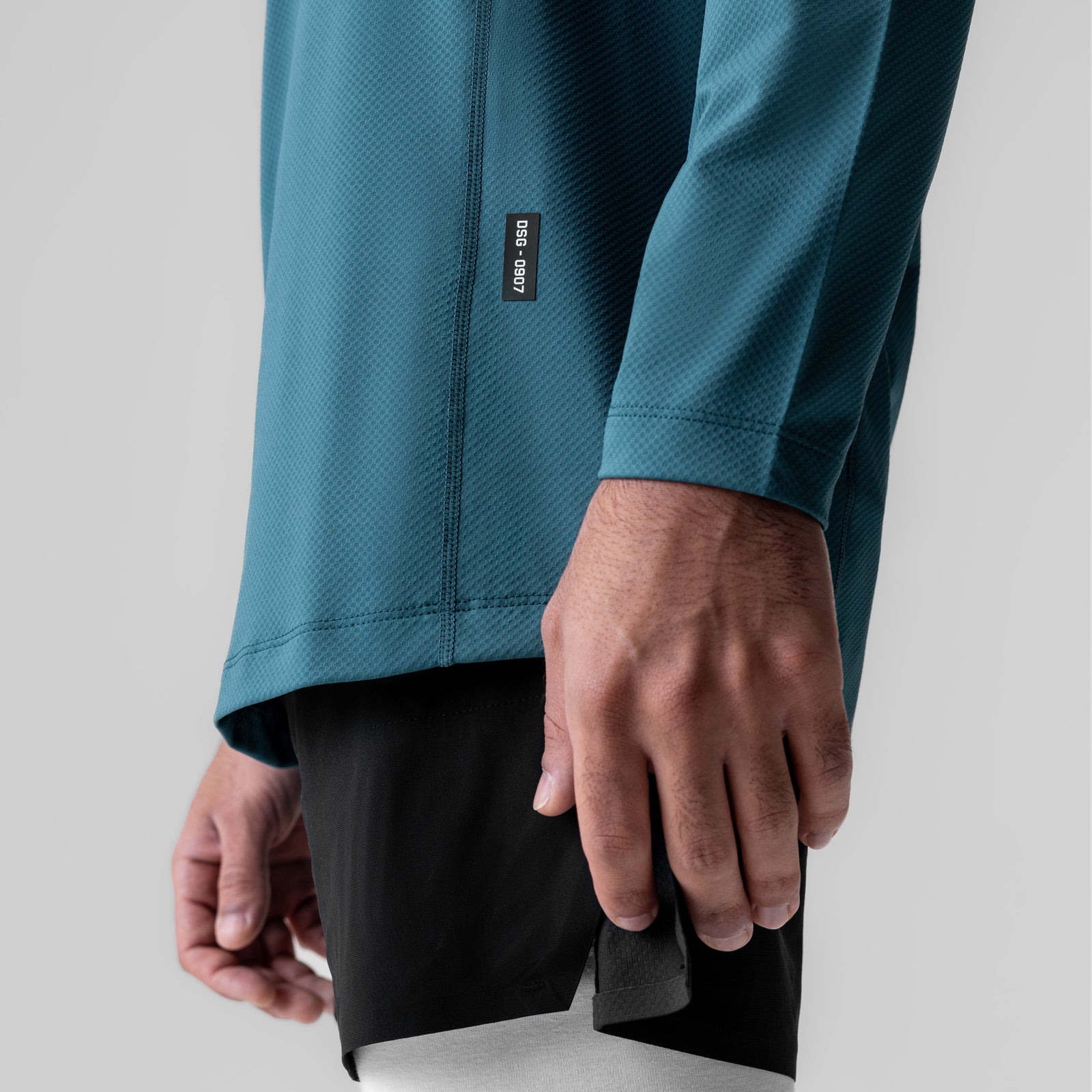 AeroSilver Training Long Sleeve in storm blue, worn by model showing sleeve and torso detail