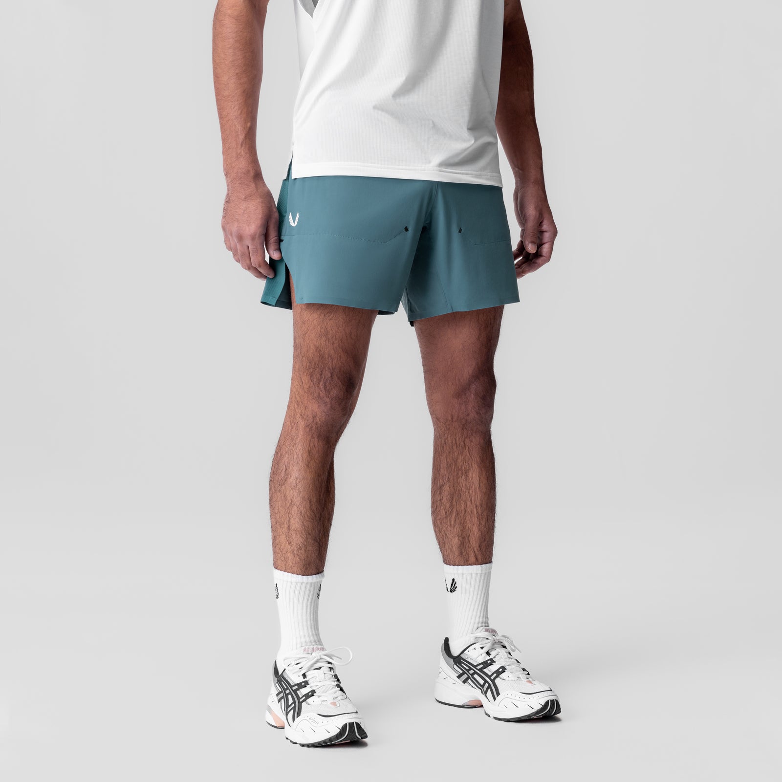 Tetra-Lite Bonded Training Short in storm blue, worn by model from waist down