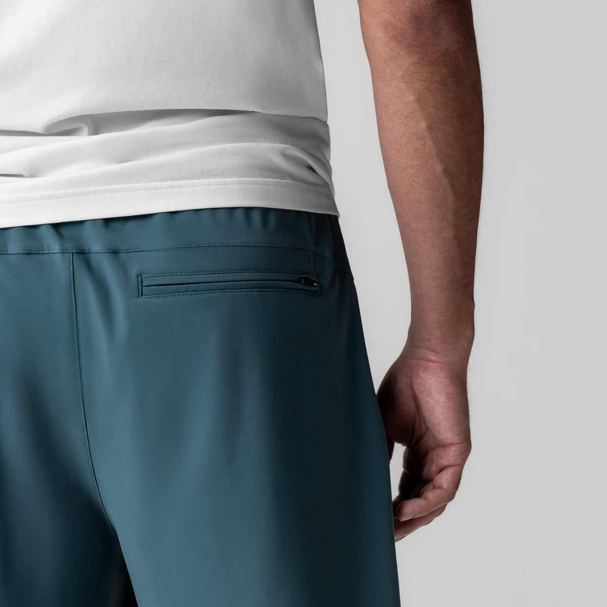 Revolutional Field Short in storm blue, worn by model showing back pocket detail