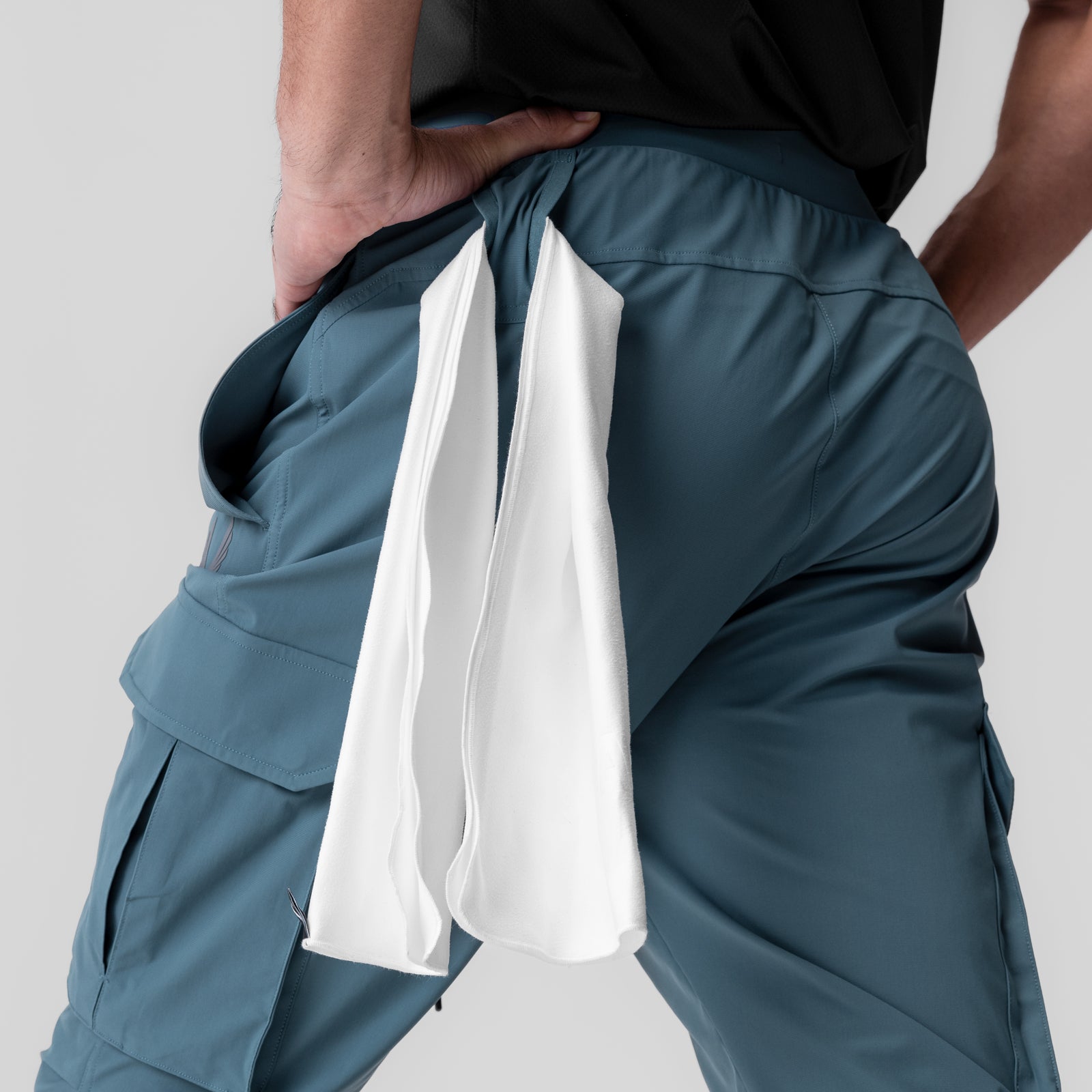 Tetra-Lite Ice Cargo jogger in storm blue, worn by model showing back pocket detail