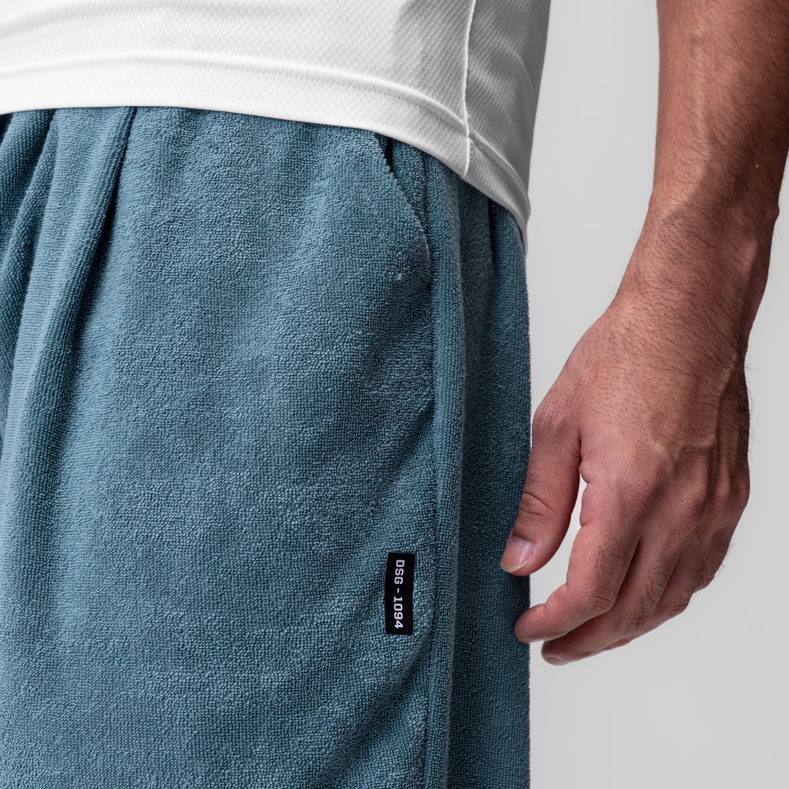 Towel Terry Relaxed Short in storm blue, worn by model showing side detail and fit