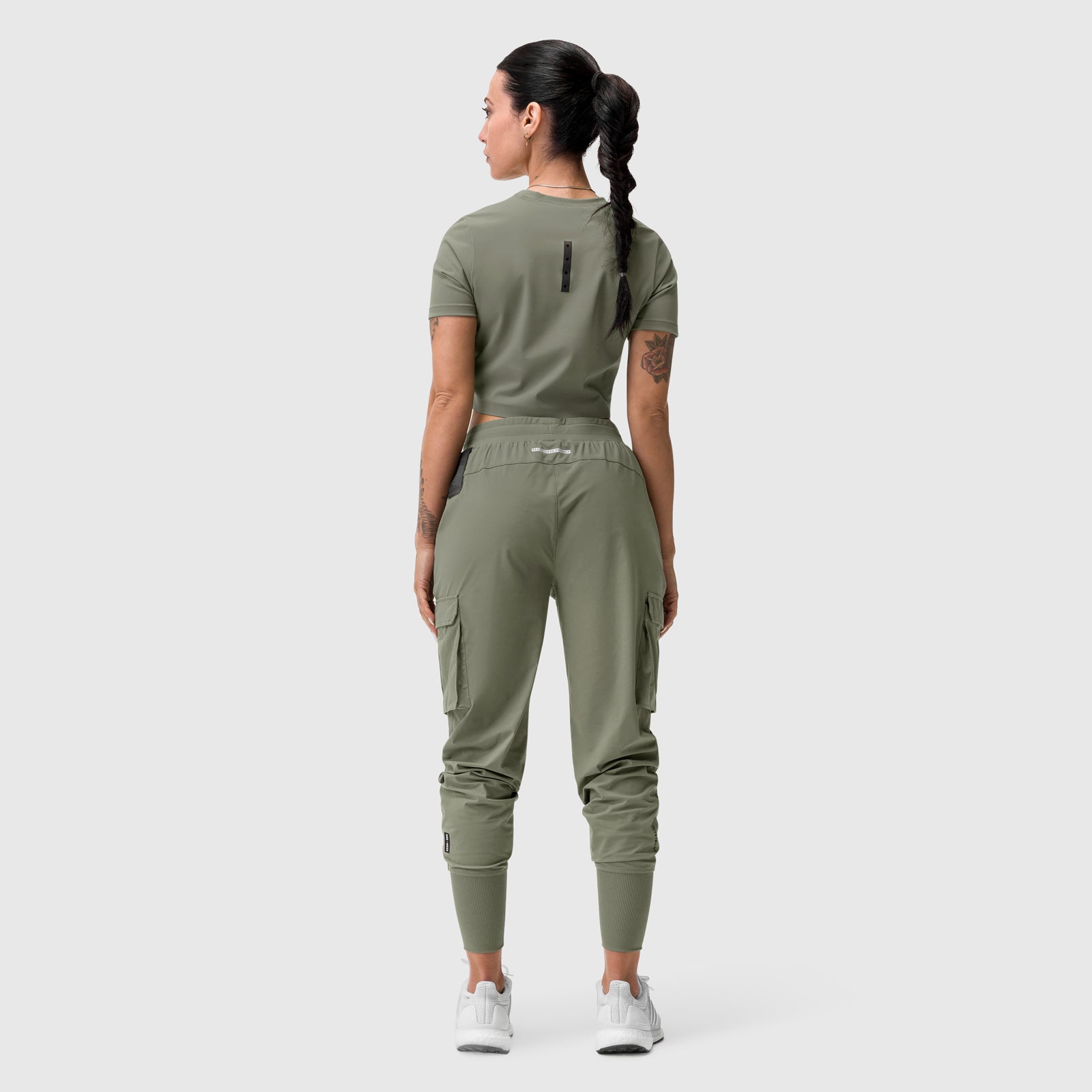 Tetra-Lite Cargo High Rib Jogger in sage, worn by model, back view