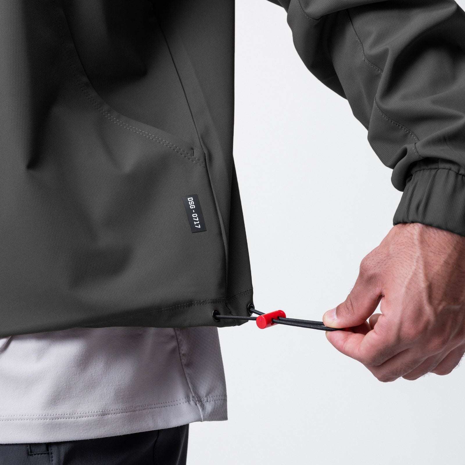 Weather-Ready Anorak Jacket in Space Grey, model adjusting drawstring detail