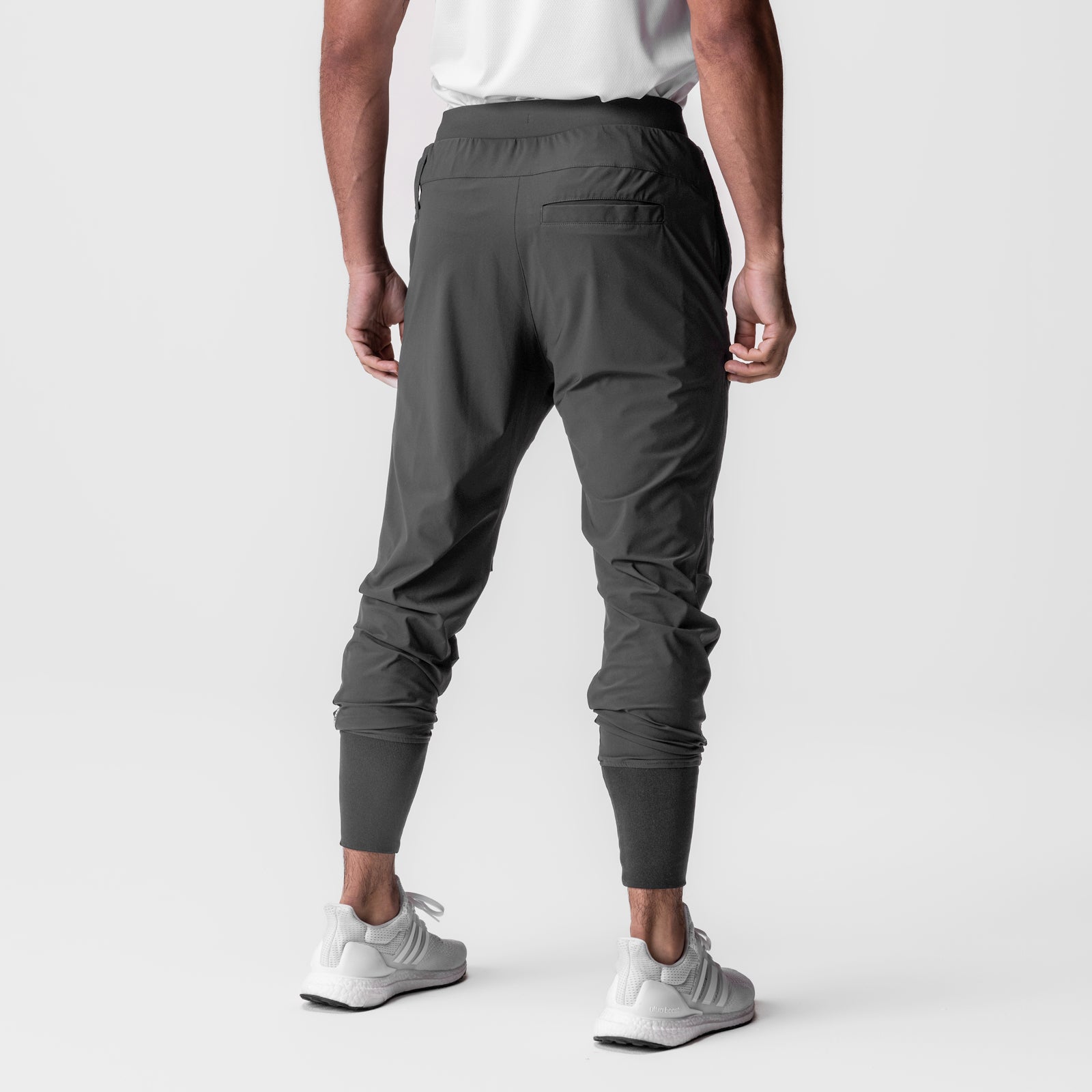 Tetra-Lite Tech High Rib Jogger in Space Grey, back view on model