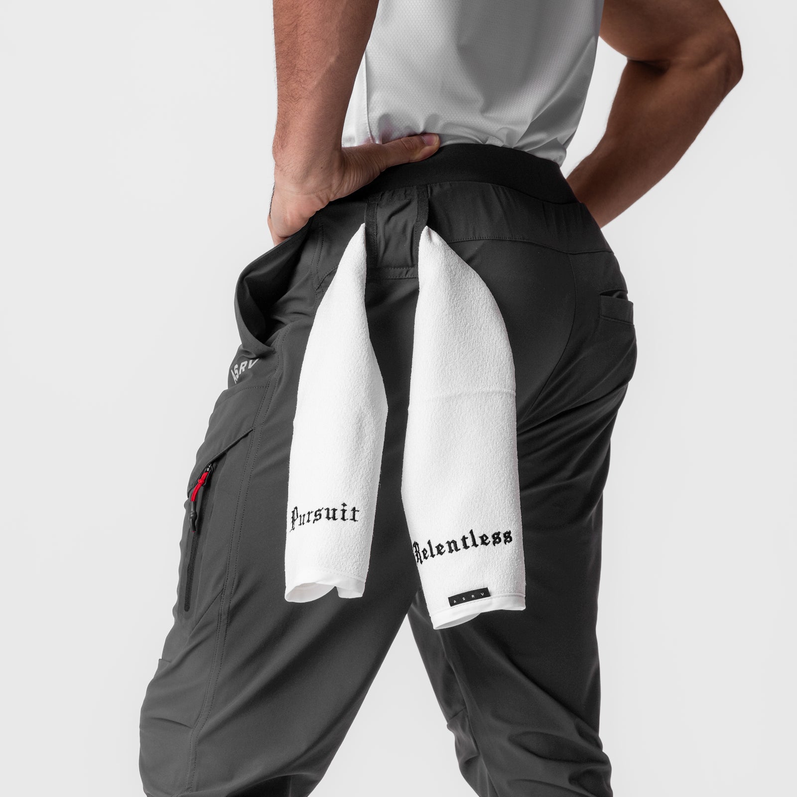 Tetra-Lite® Tech High Rib Jogger in Space Grey, model holding white towel at waist