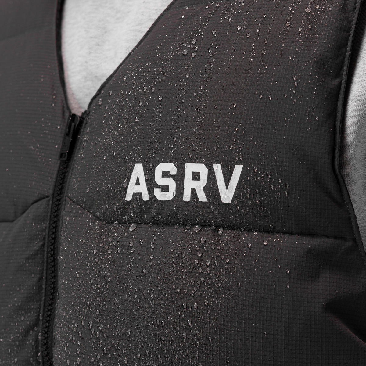 ASRV Ripstop Insulated Puffer Gilet in space grey, worn by model, water-resistant detail