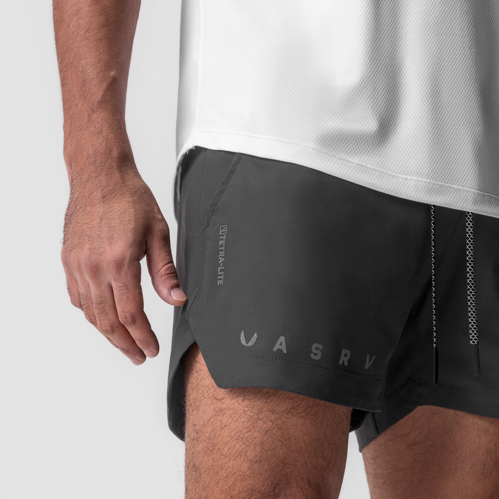 Tetra-Lite 5" Linerless Short in Space Grey, worn by model, side view