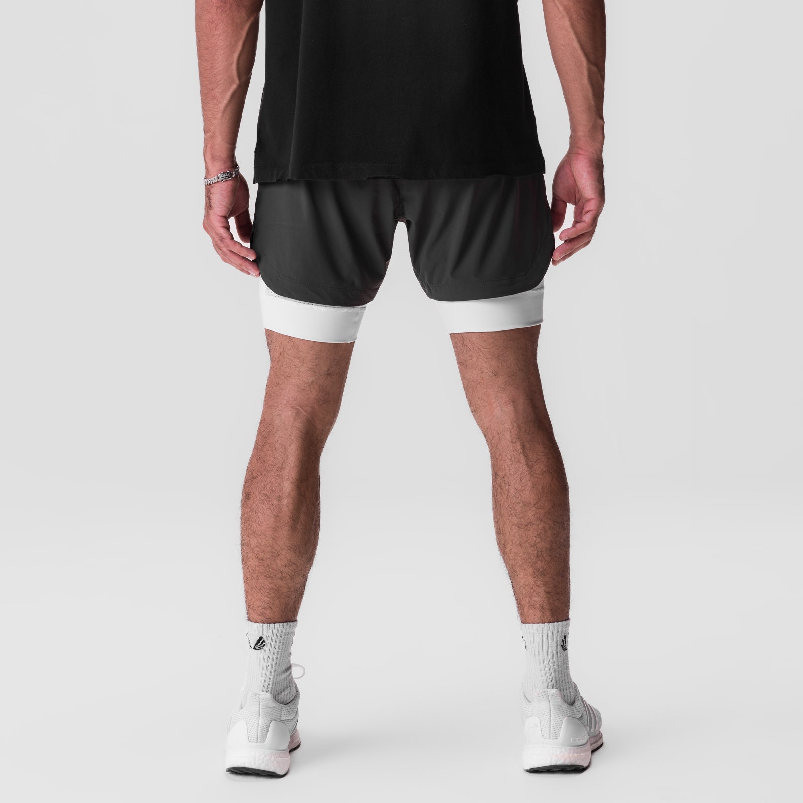 Tetra-Lite 5" Liner Short in Space Grey with White stripe, back view on model