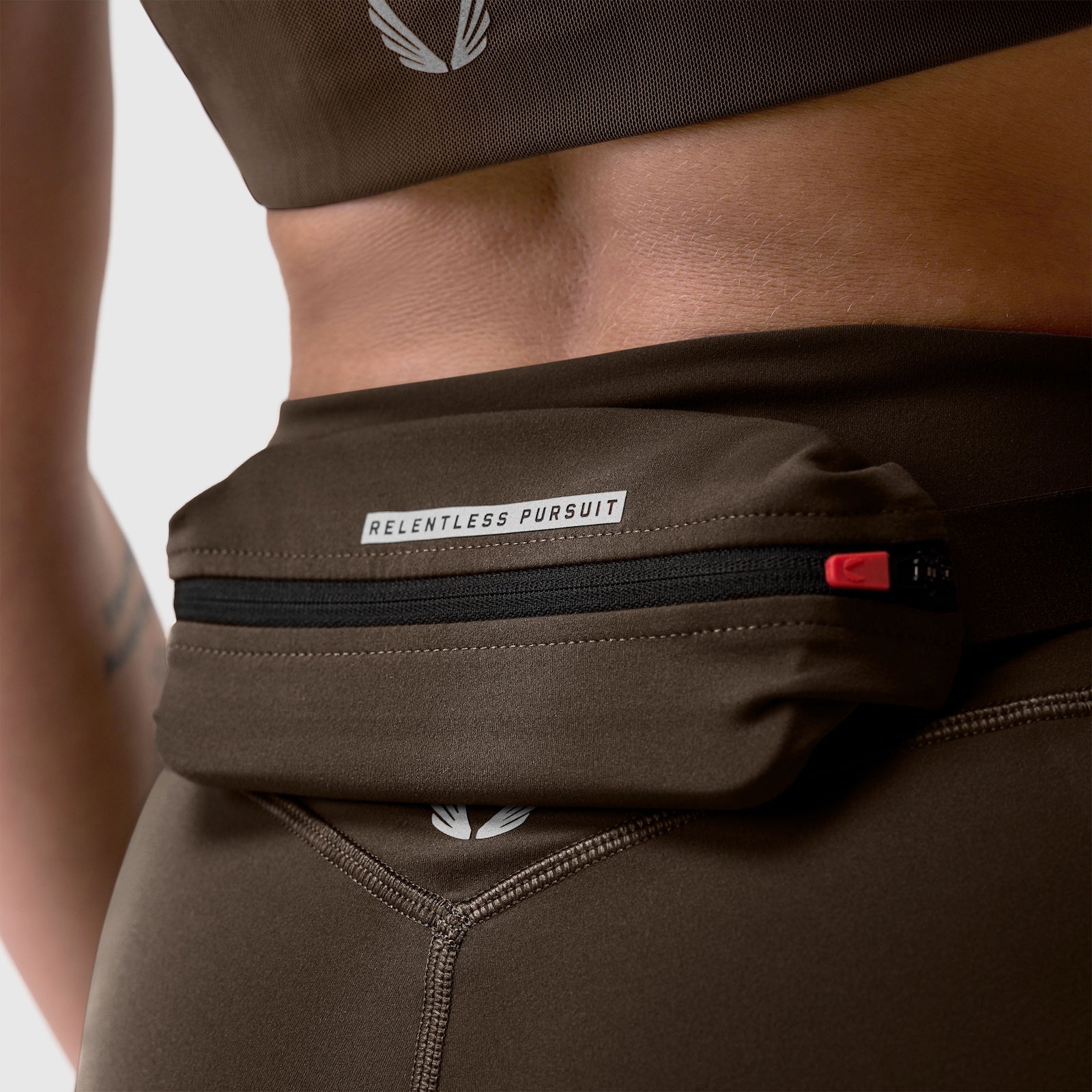 LYCRA® 3-in-1 Biker Short in Dark Earth worn with waistband detail visible
