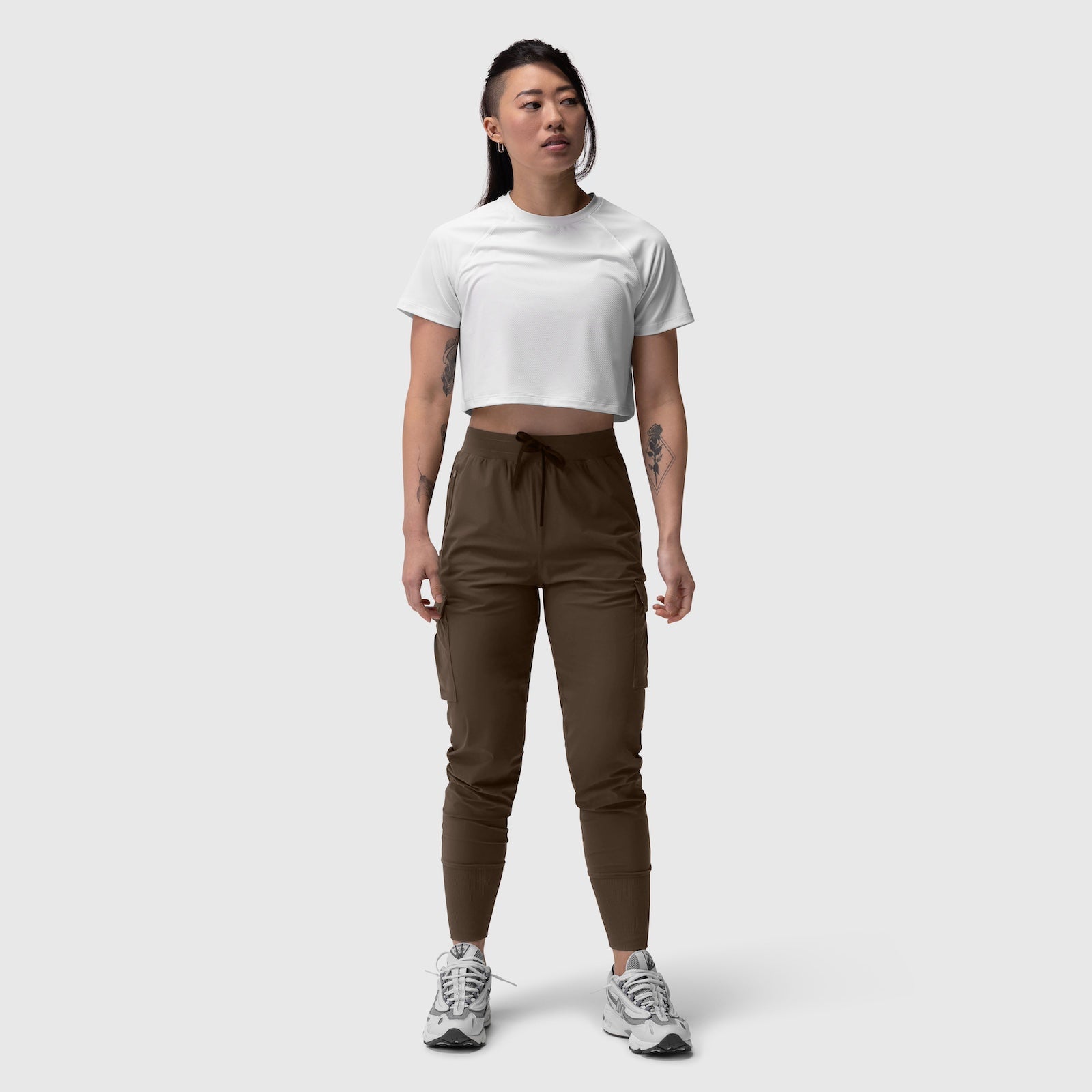 Tetra-Lite Cargo High Rib Jogger in Dark Earth, worn with white crop tee, front view