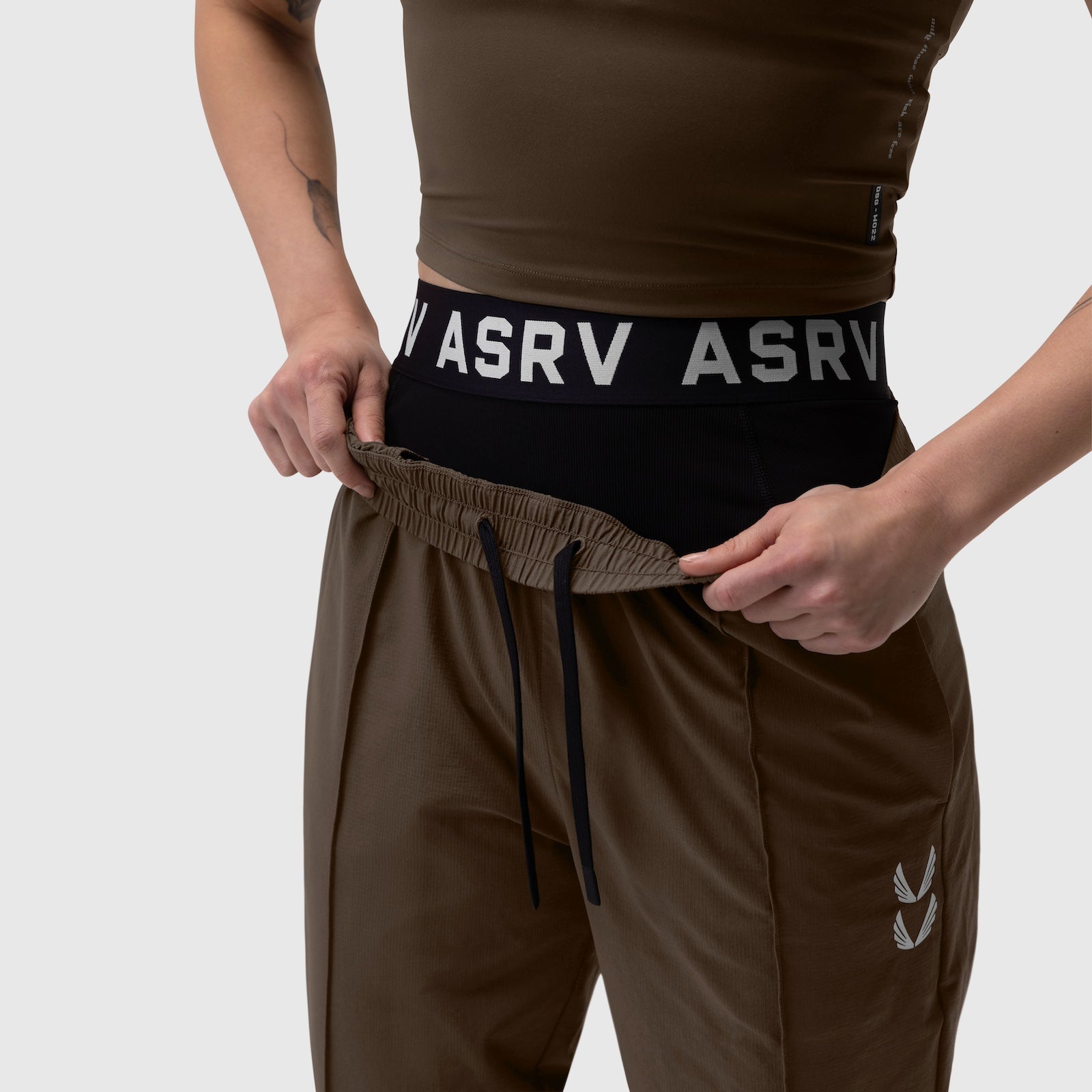 W036 Ripstop Relaxed Track Pant in Dark Earth, model wearing with ASRV waistband visible