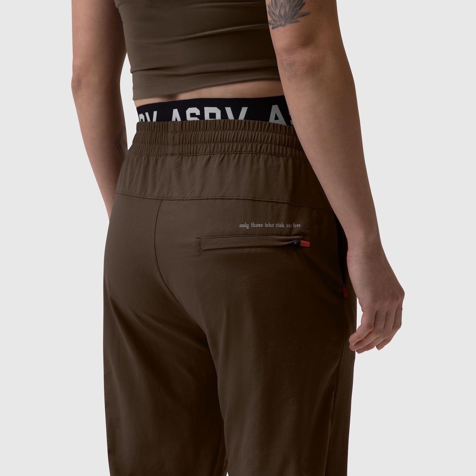W036 Ripstop Relaxed Track Pant in Dark Earth, worn by model, back view