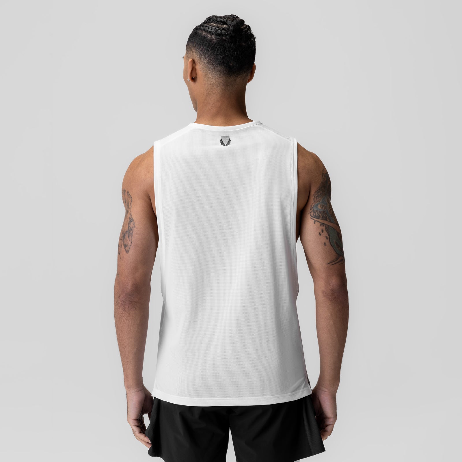 Ice-Skin™ Muscle Tank in white, rear view on model
