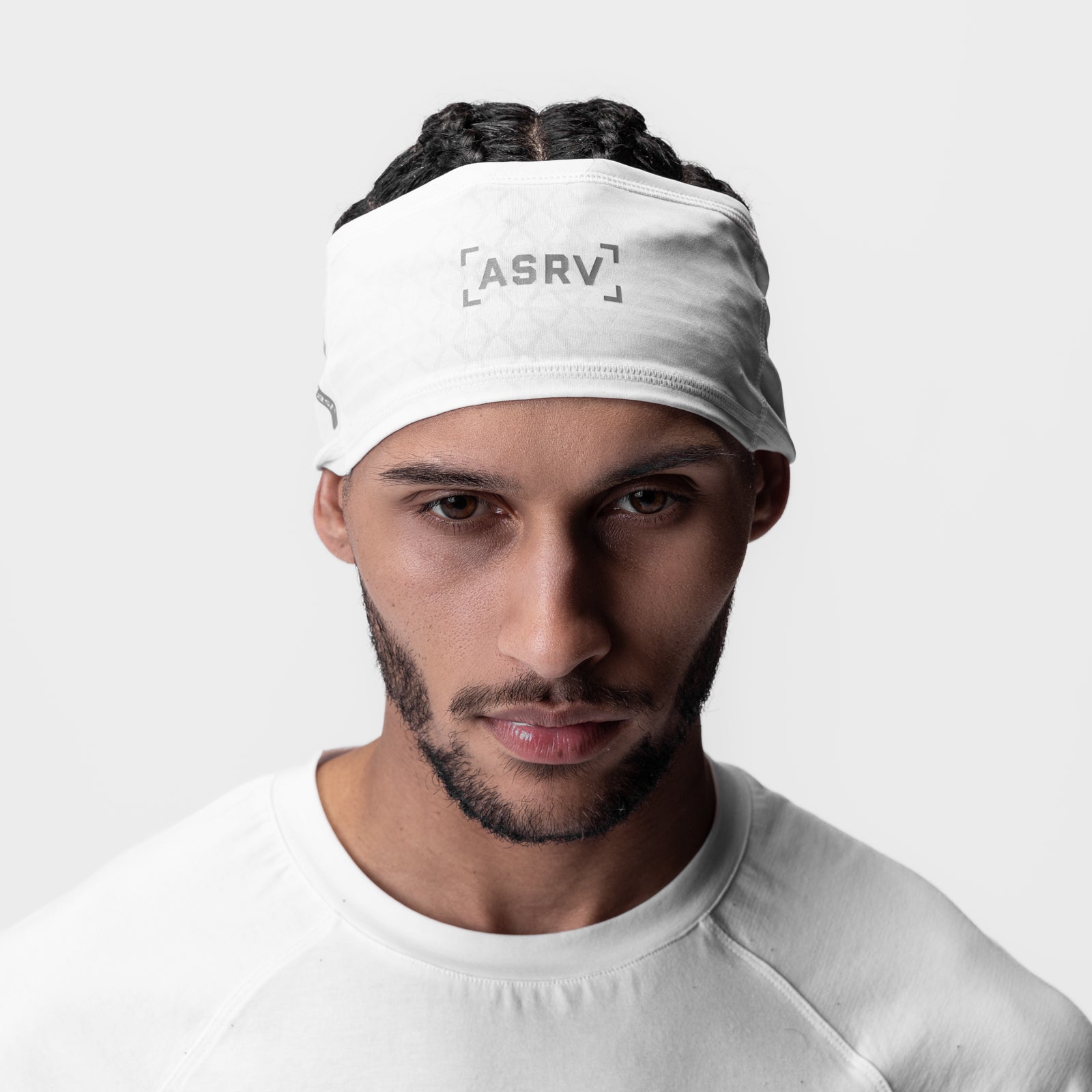 ASRV Phase Change Headband in white with reflective logo, worn by male model