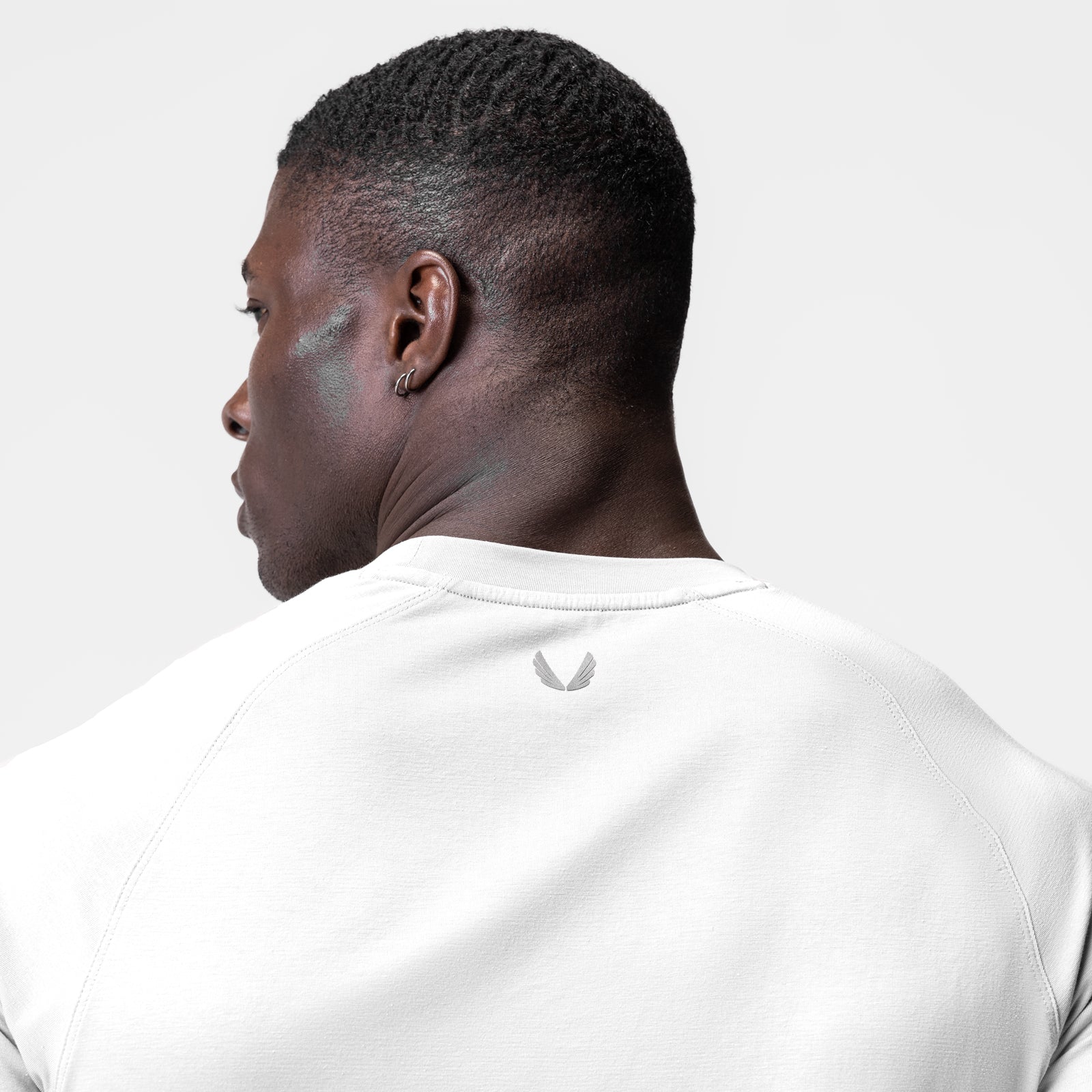 White Supima® Established Tee worn by model, rear view