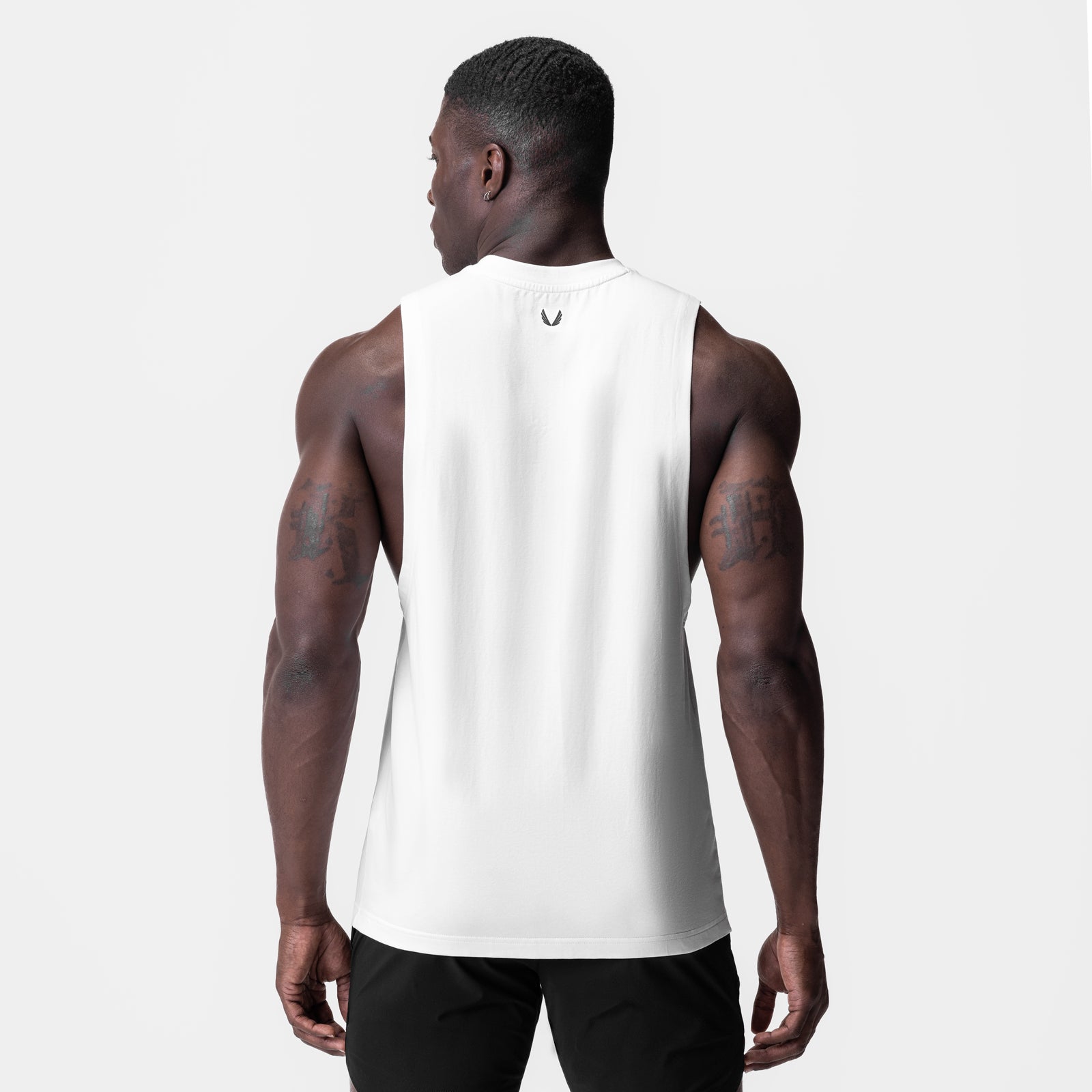 White Supima® Muscle Tank worn by model, back view