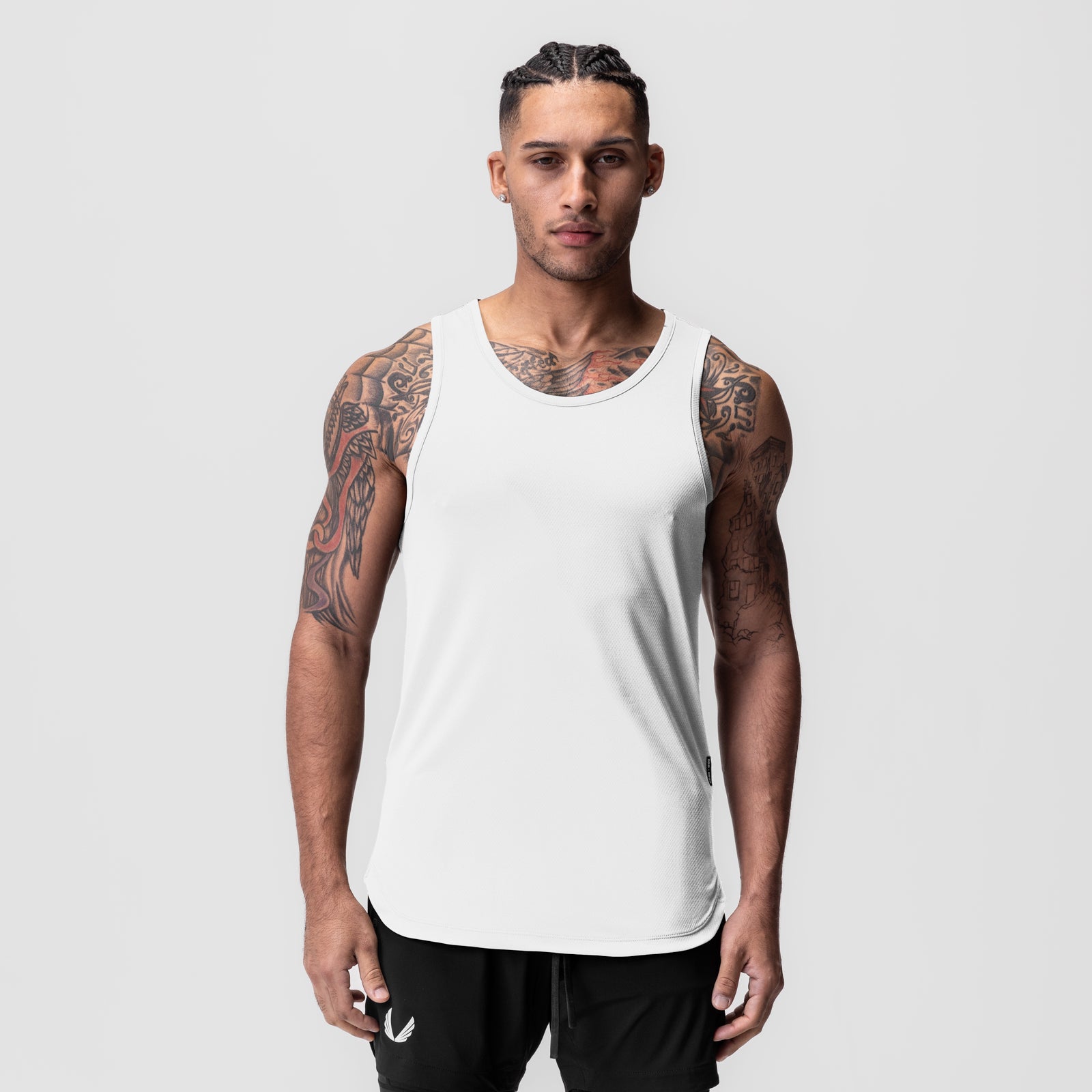 White AeroSilver® tank top worn by male model with tattoos, front view
