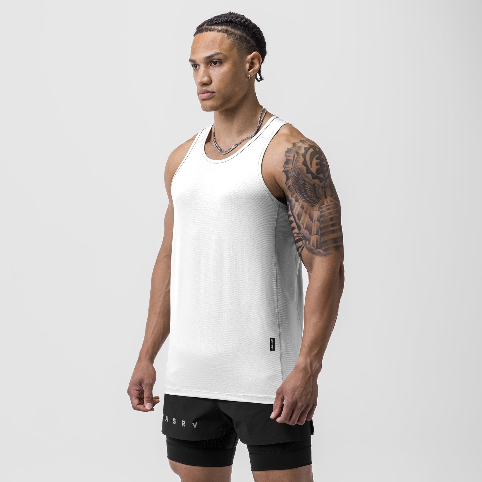White AeroSilver Training Singlet worn by model, side profile view