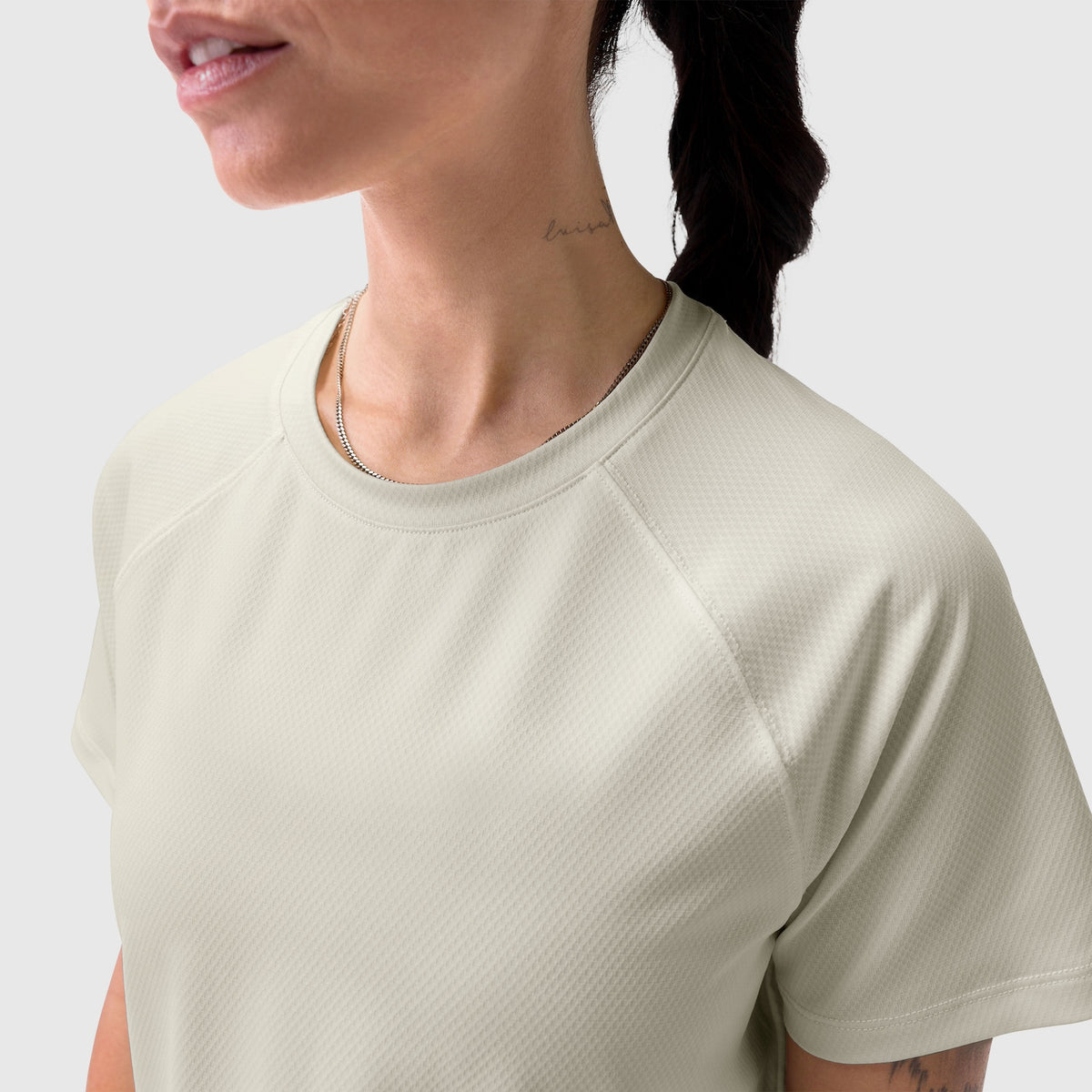 AeroSilver® Cropped Tee in Ivory Cream worn by model, front view