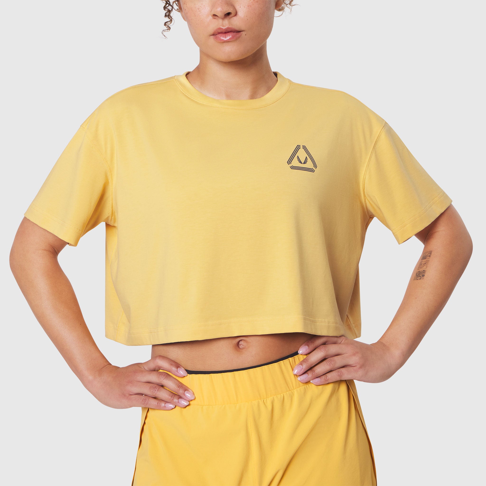 W082 Supima Ice-Skin Reversible Crop Tee in Amber worn by model, front view