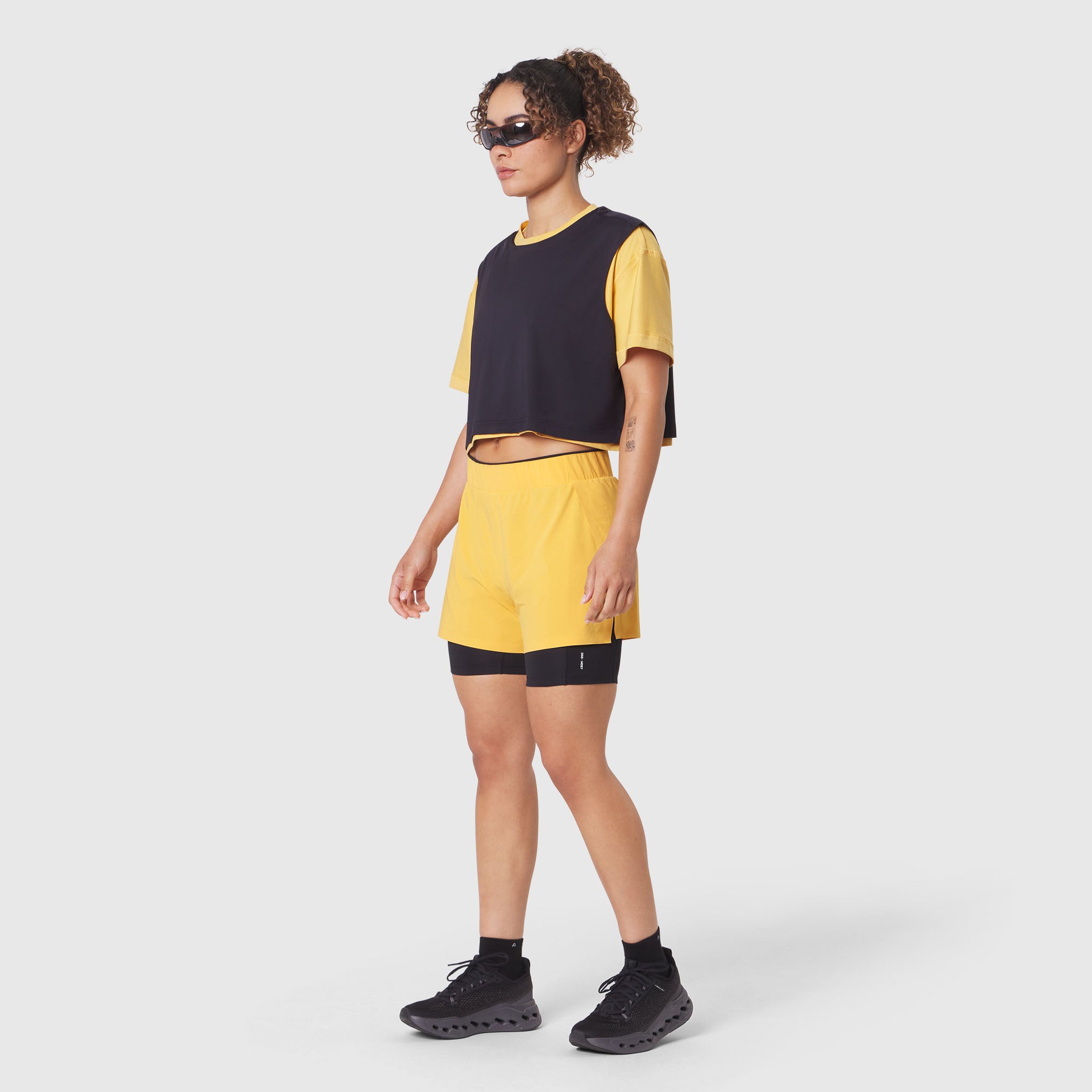 W082 Supima Ice-Skin Reversible Crop Tee in Amber and Black, worn by model
