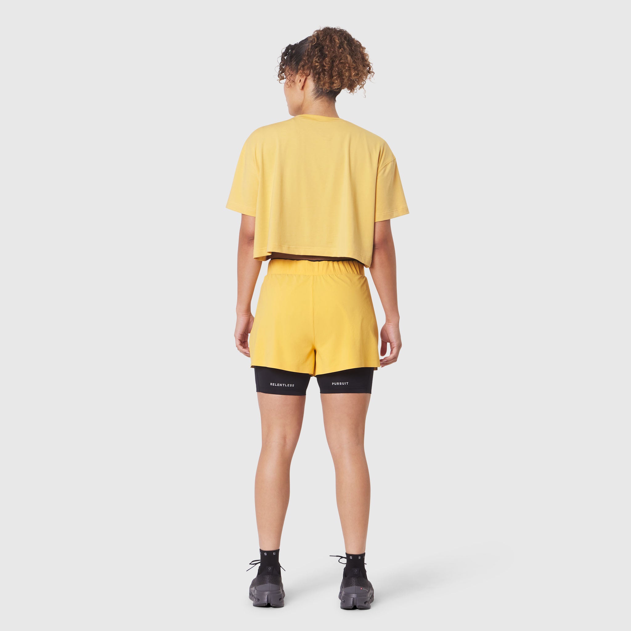 W082 Supima Ice-Skin Reversible Crop Tee in Amber worn with matching shorts, back view