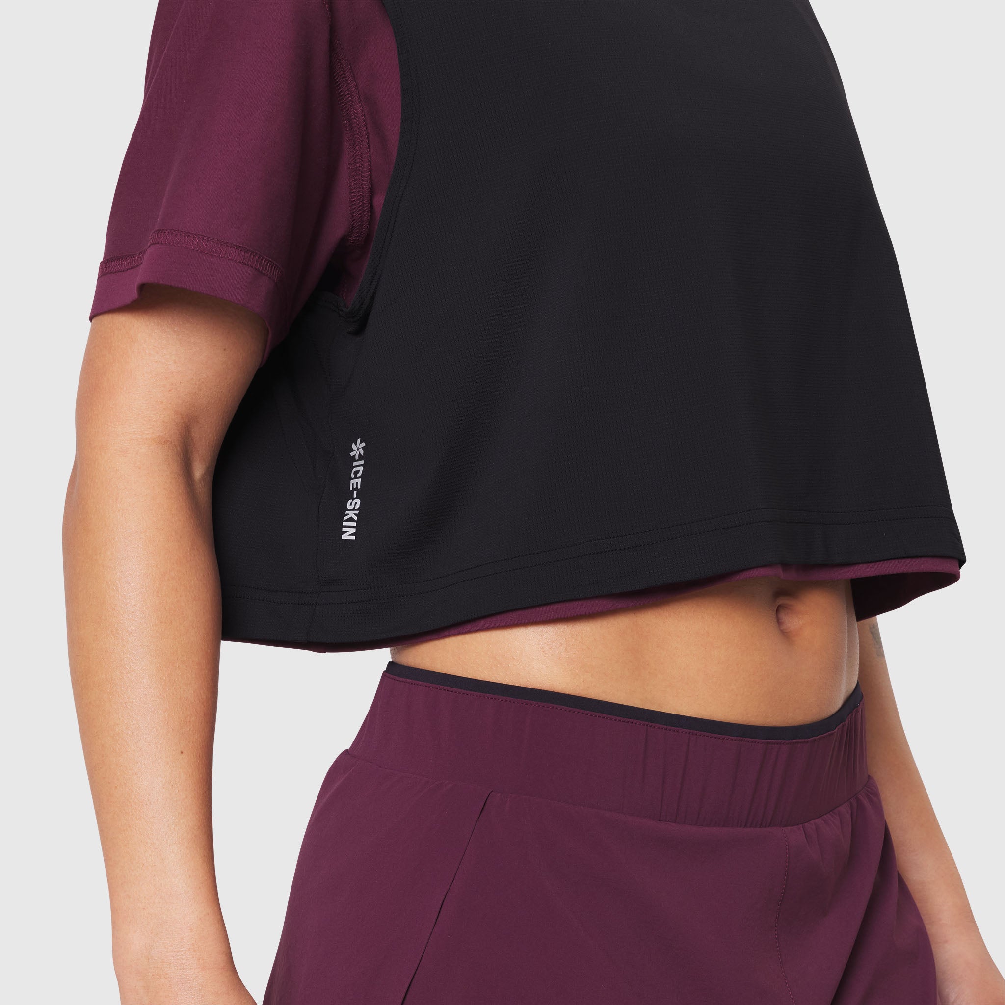 W082 Supima Ice-Skin Reversible Crop Tee in Merlot and Black, worn by model