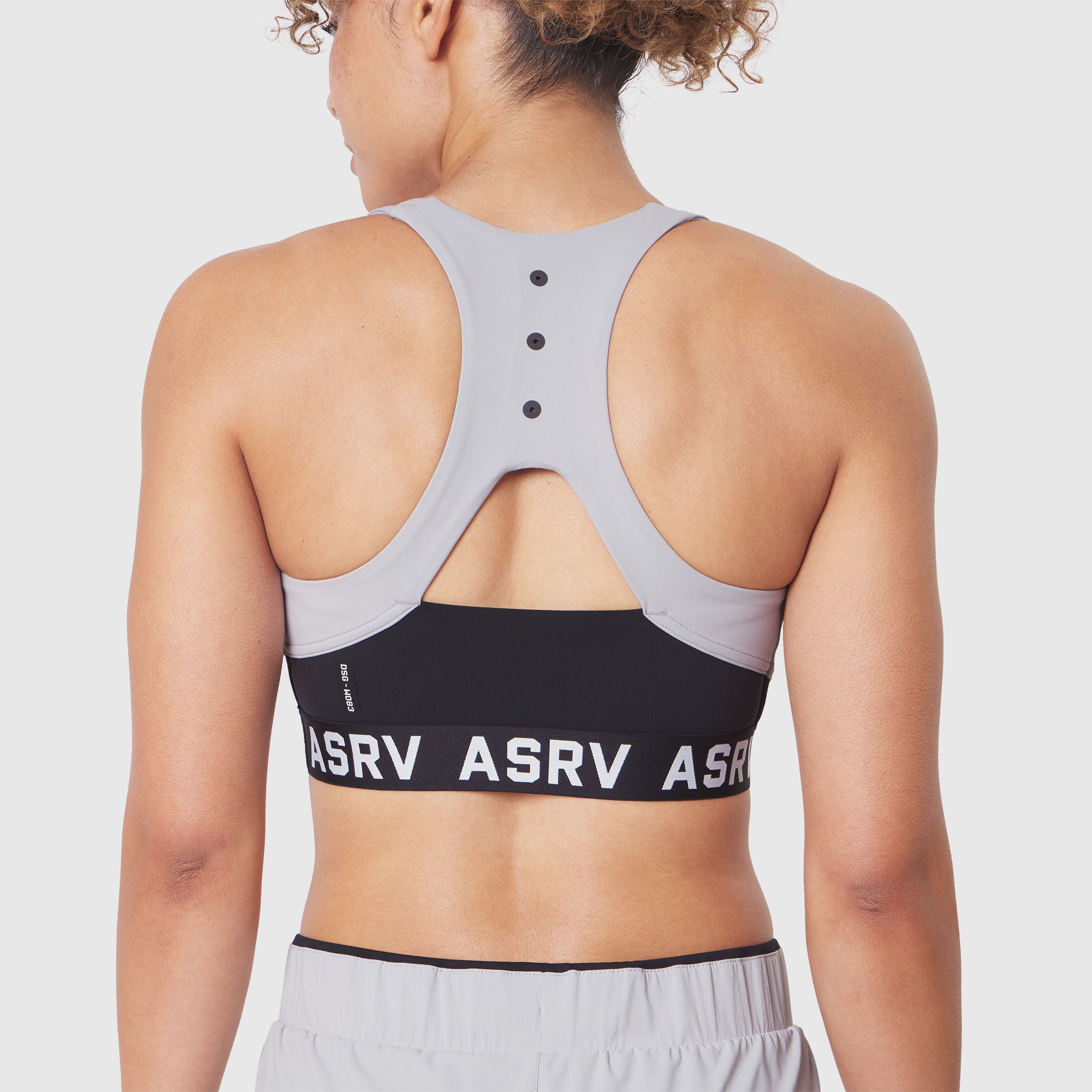 W083 LYCRA® ADAPTIV Racerback Sports Bra in Slate Grey, back view on model