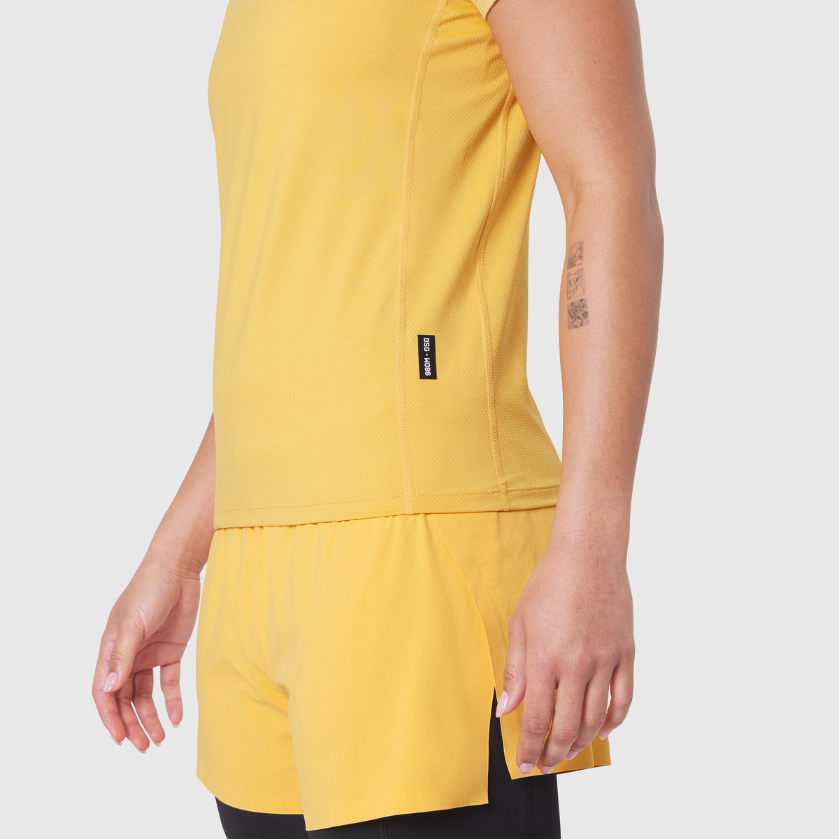 AEROSILVER® UPF50+ Run Tee in Amber worn by model, side view